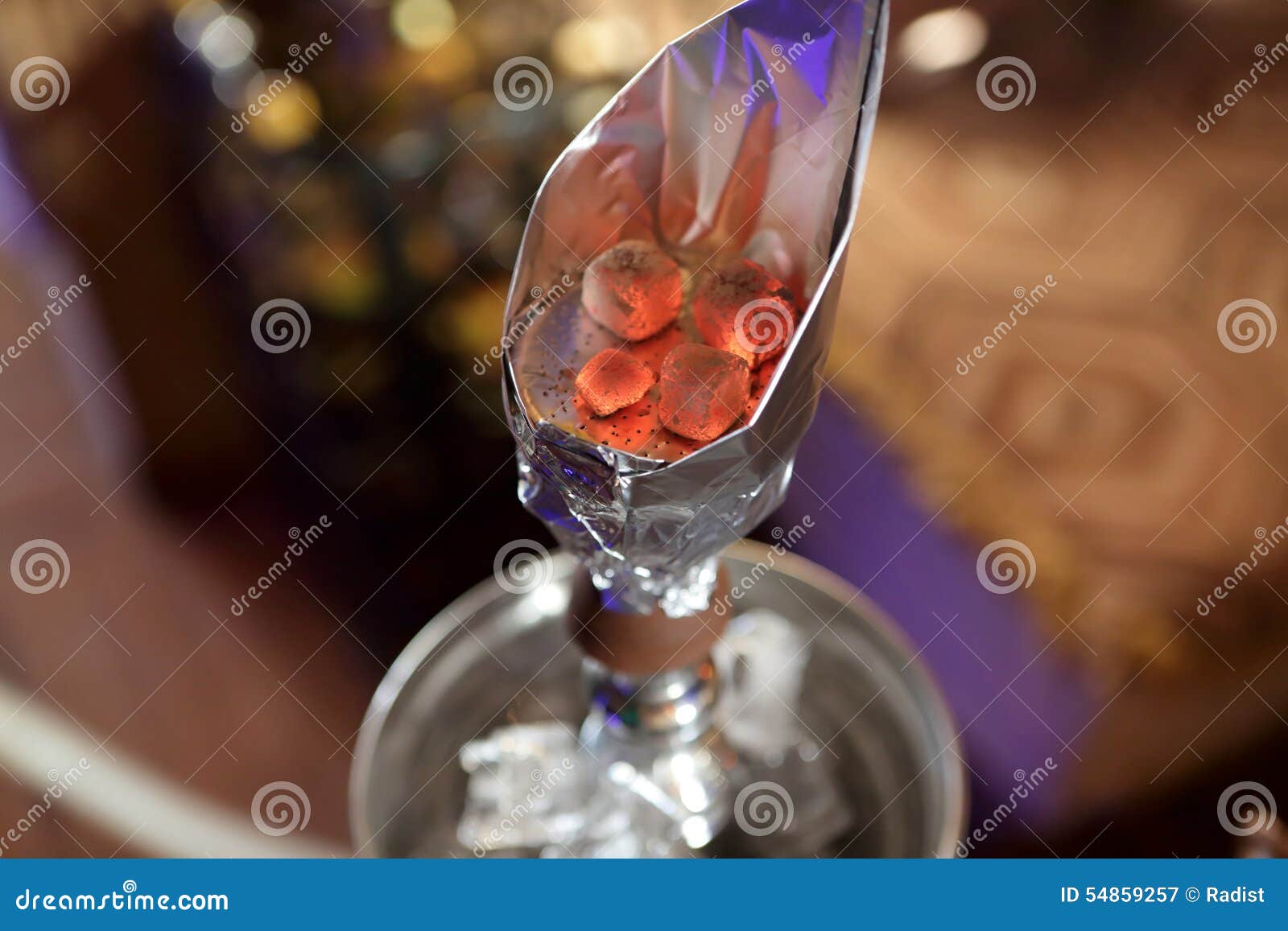 Embers in a cup of hookah stock image. Image of east 54859257