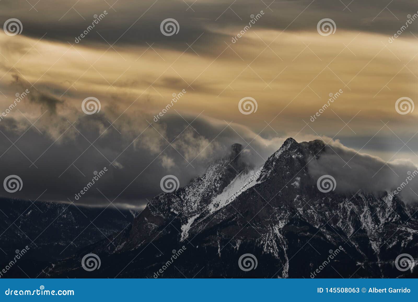 emblematic mountain of pedraforca with snow and foog