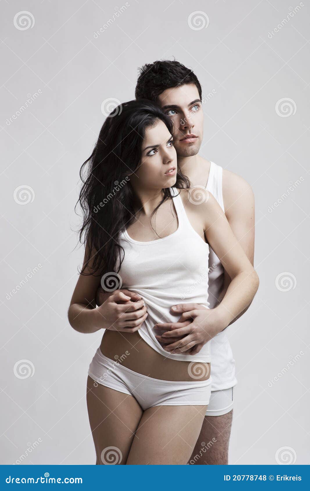 Stunning Couple In Underwear Posing For Camera Stock Photo, Picture and  Royalty Free Image. Image 65637597.