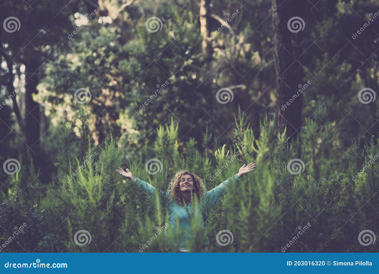 Embracing Outdoor and Love Nature Concept with Happy Beautiful Woman in