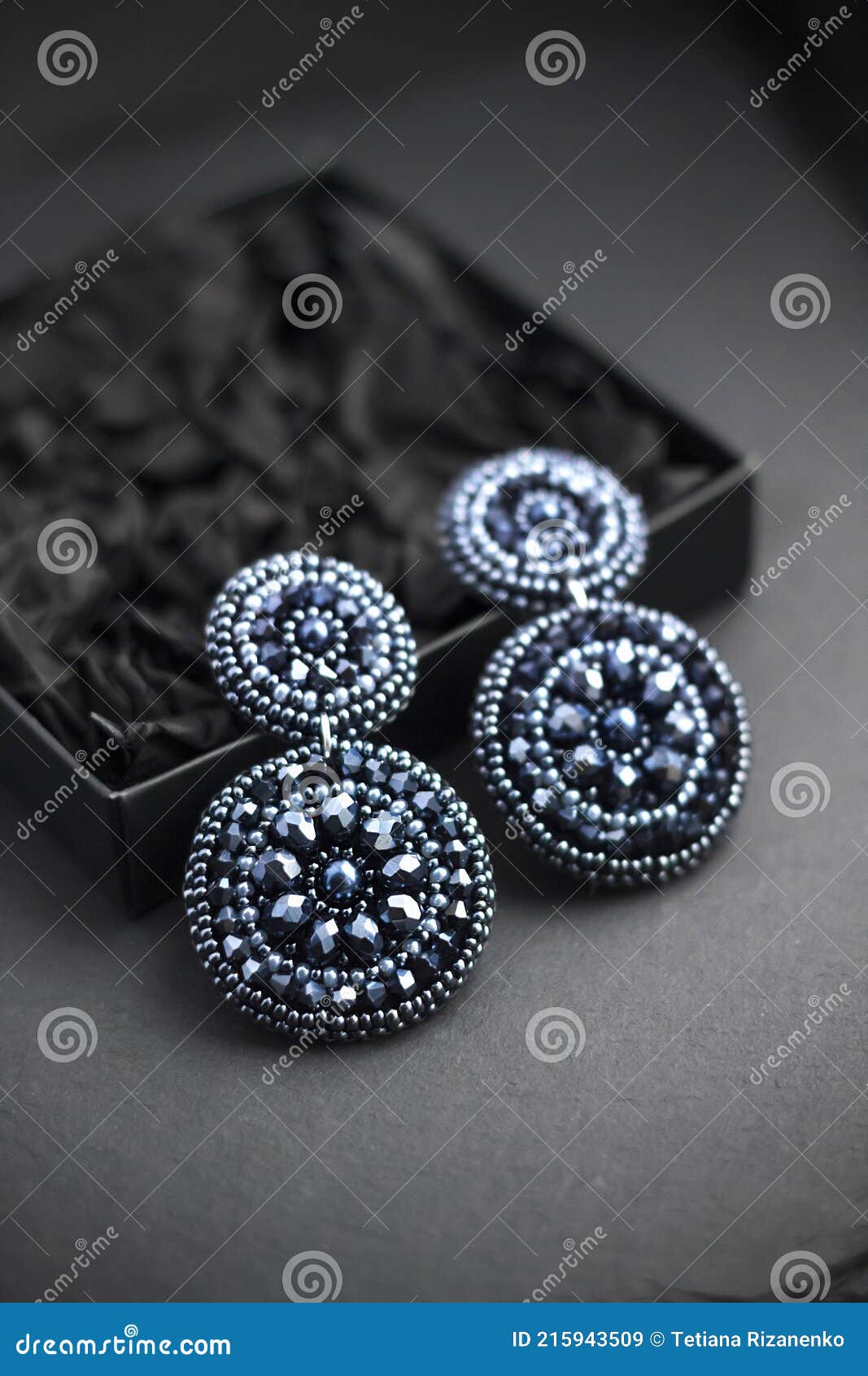 Embroidered Statement Earrings on Black Background Stock Image Image
