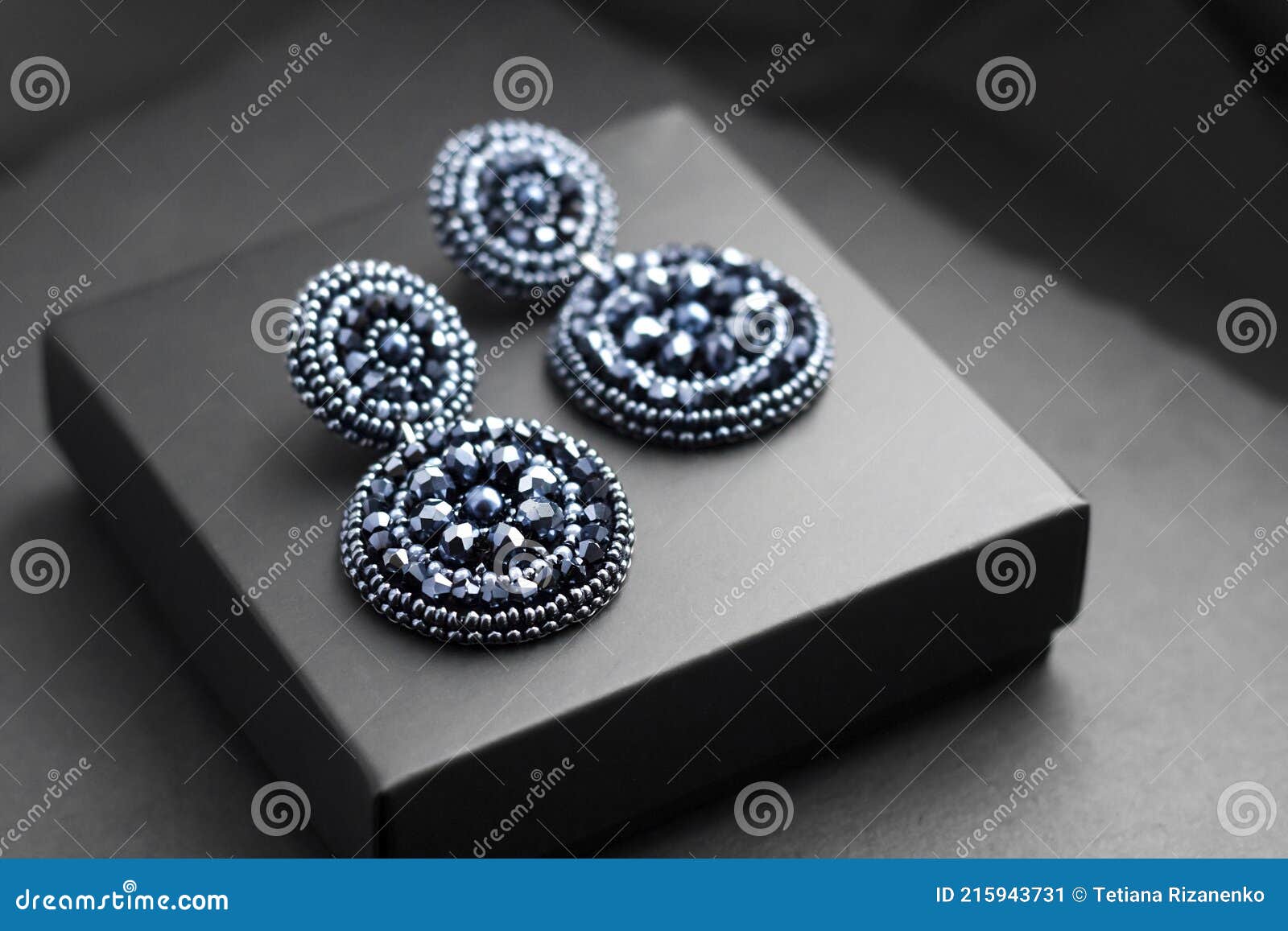 Embroidered Statement Earrings on Black Background Stock Image Image