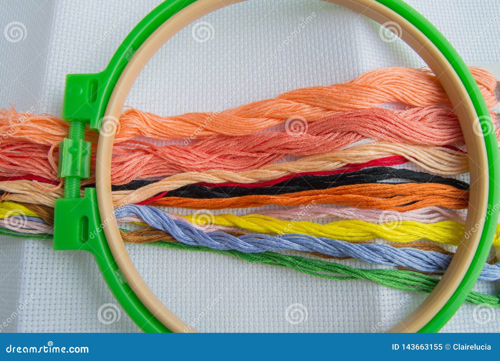 Embroidery Hoop with Canvas and Bright Sewing Threads for Table