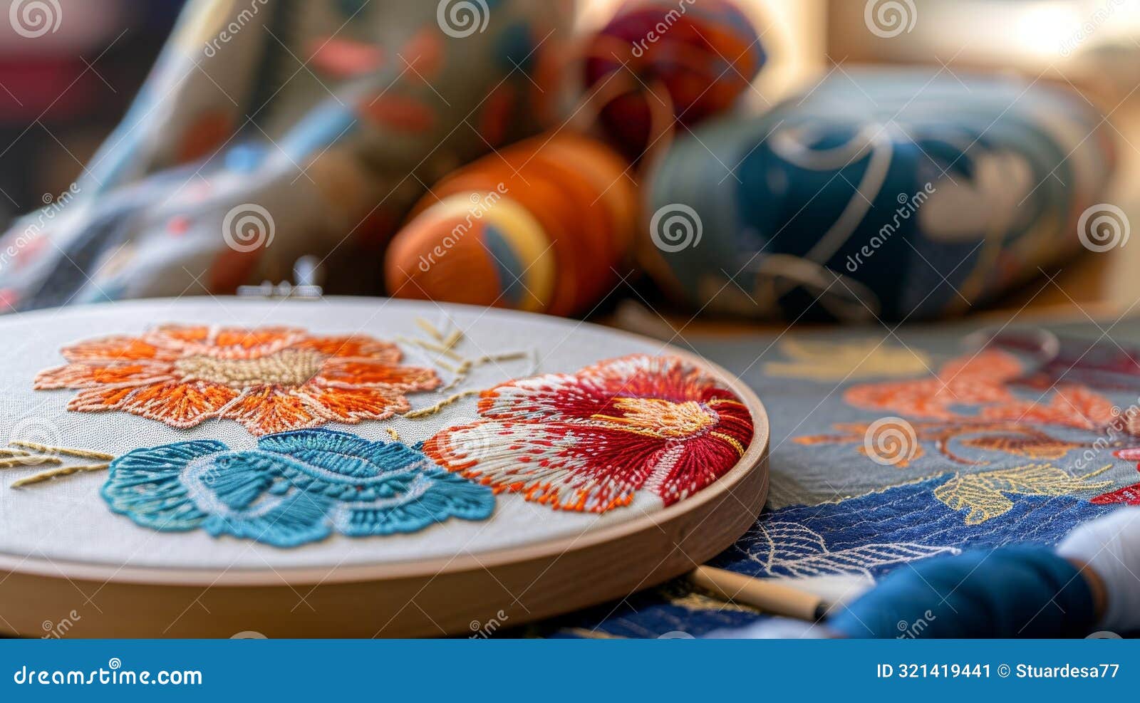 embroidery hoop with vibrant floral patterns in progress