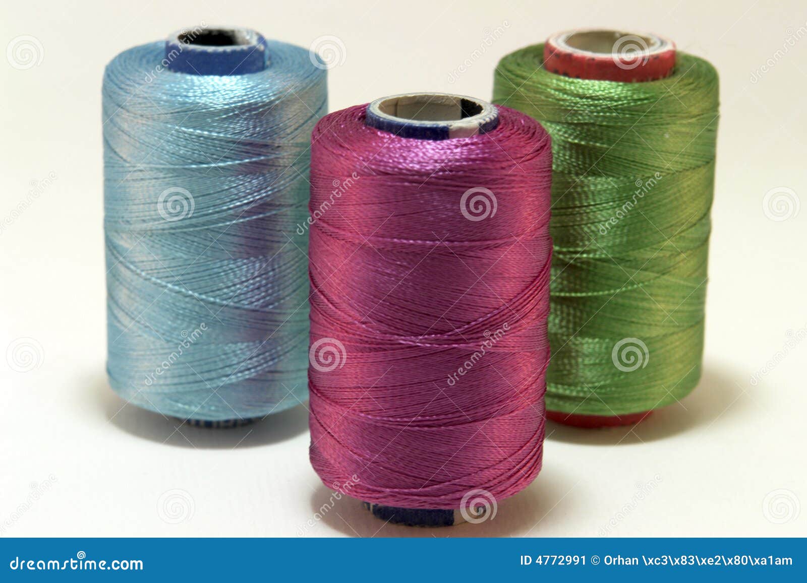 Embroidery yarn bobbins stock image. Image of textile 4772991