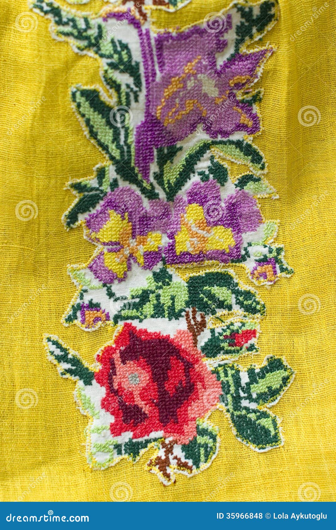 Embroidery on yellow cloth stock photo. Image of thread 35966848