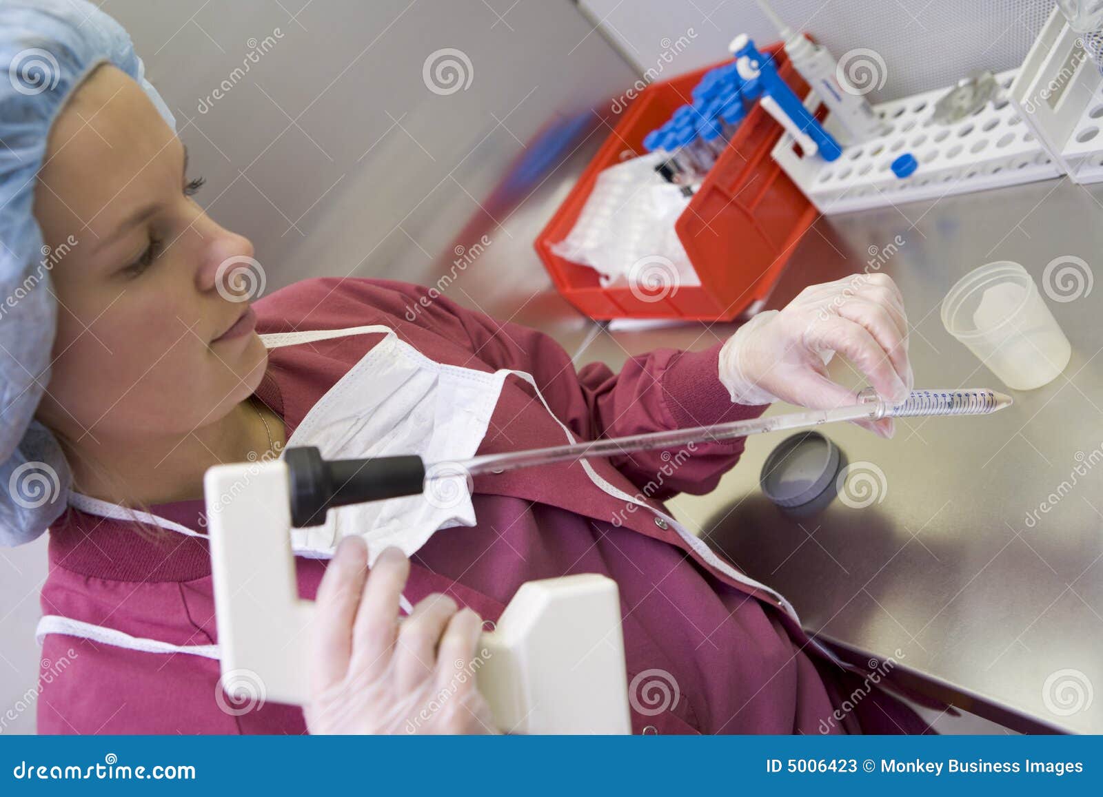 embryologist processing sample