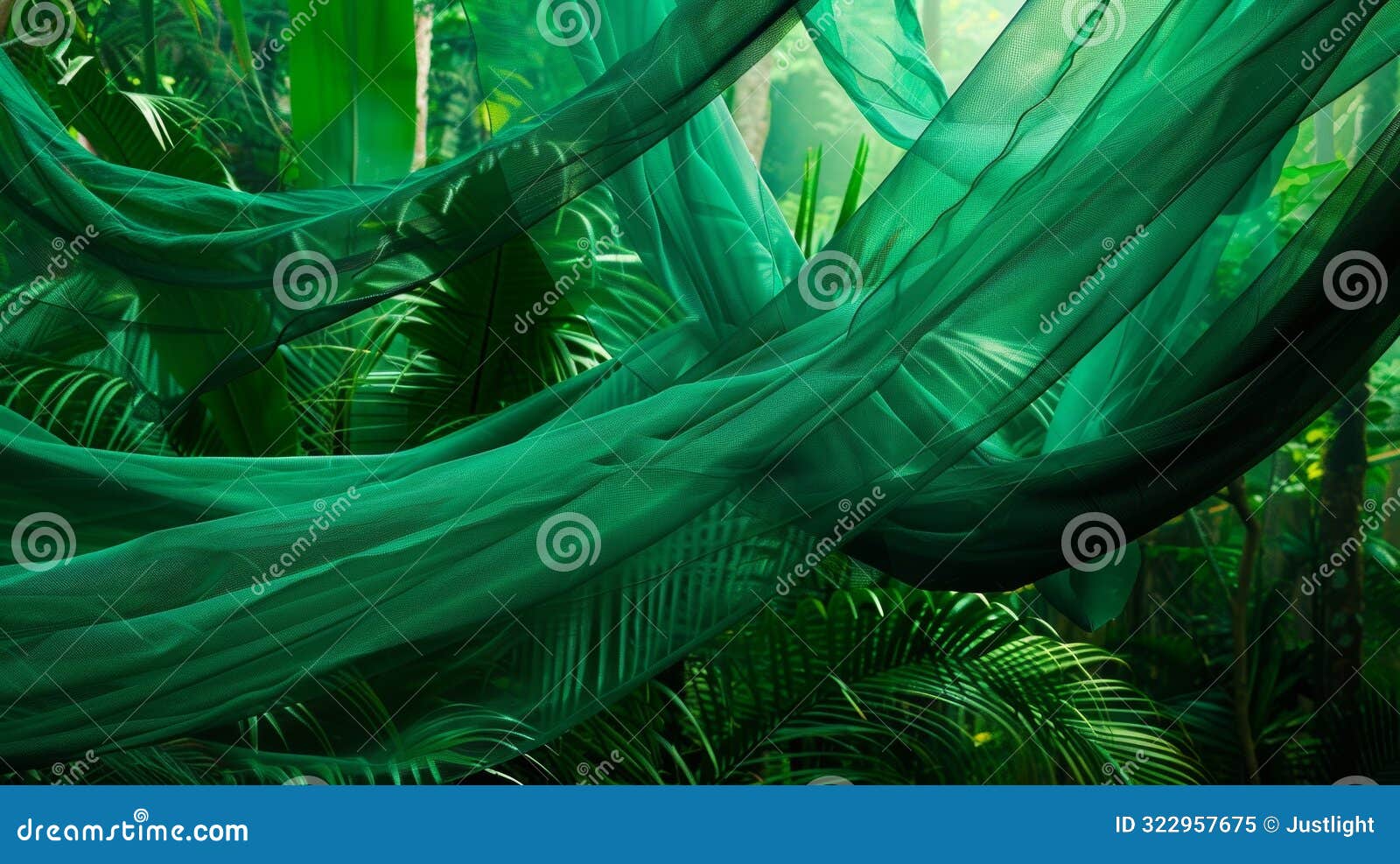 the emerald green fabric sways to and fro with the rhythm of the wind creating an entrancing sight in the dense