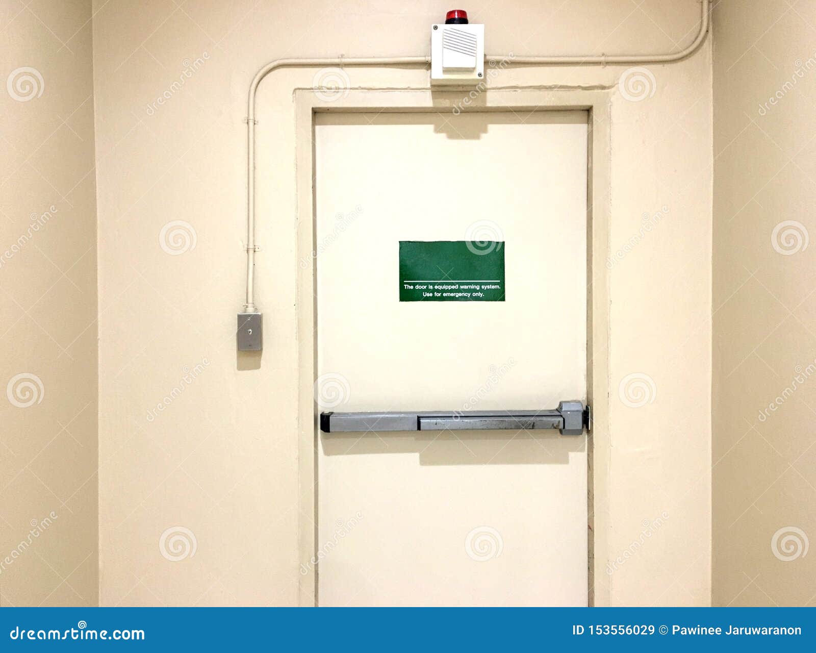 Emergency Exit Door with Siren Alarm in Store Building. Stock Image