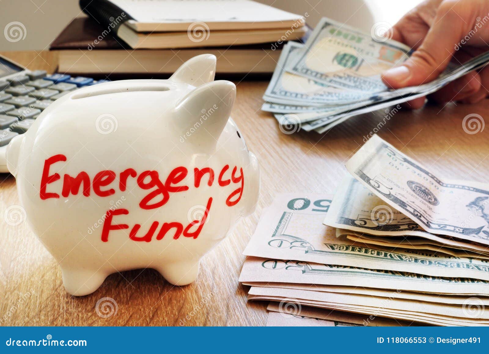 emergency fund written on a piggy bank.