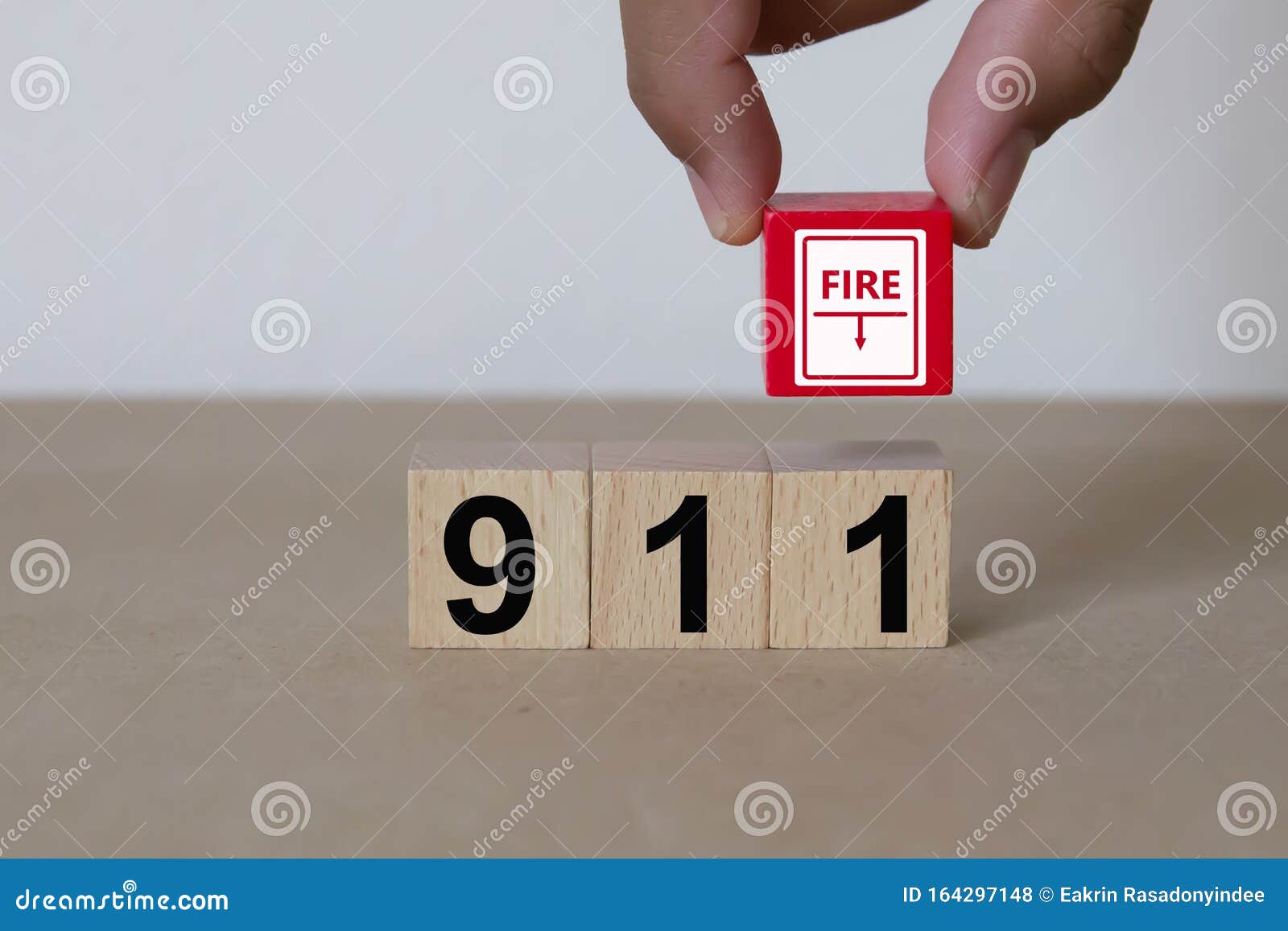 Fire Emergency Number 911 Services on Wooden Blocks. Stock Photo
