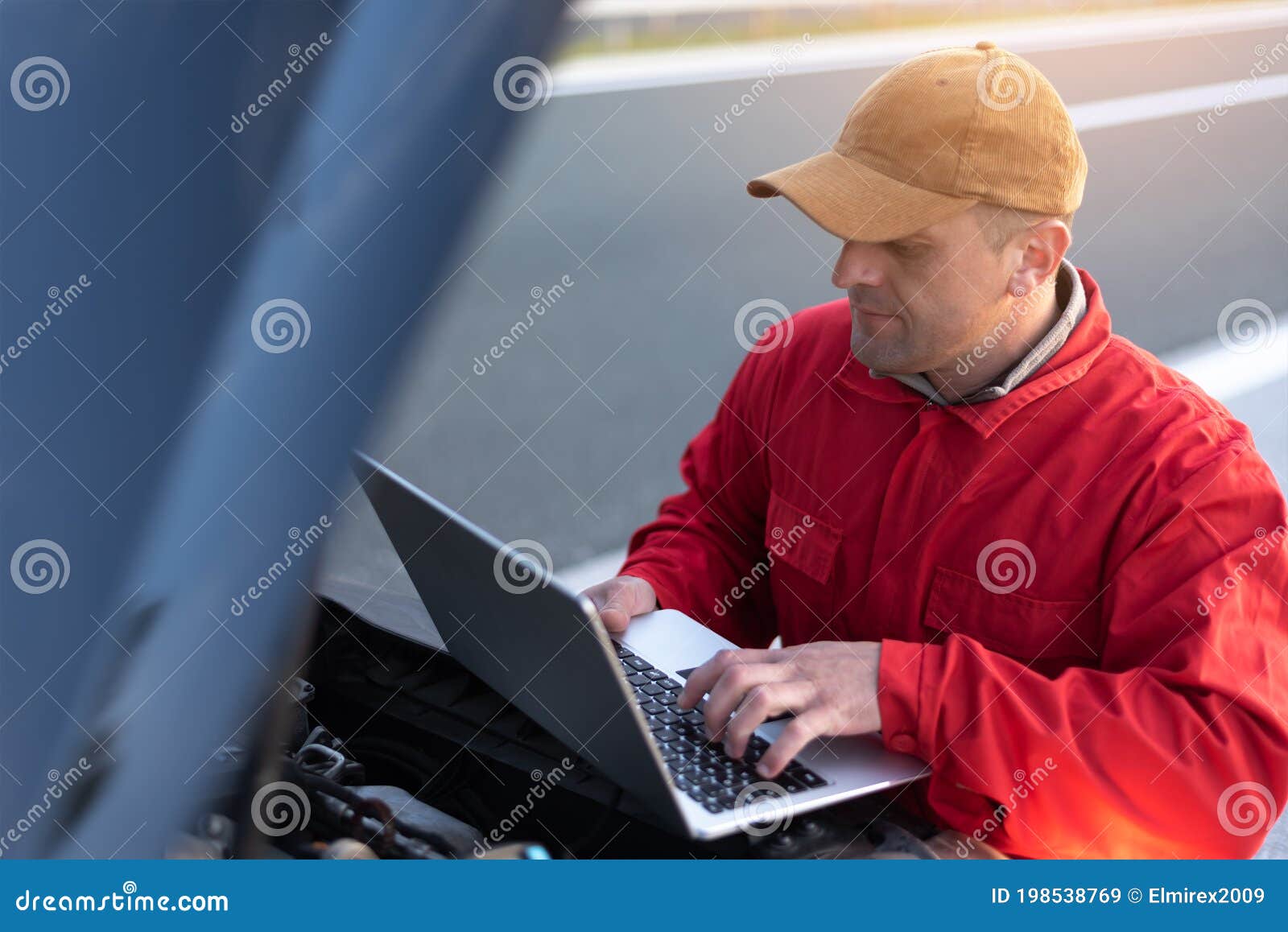 Emergency Roadside Assistance, Road Assistance Worker in Uniform Trying