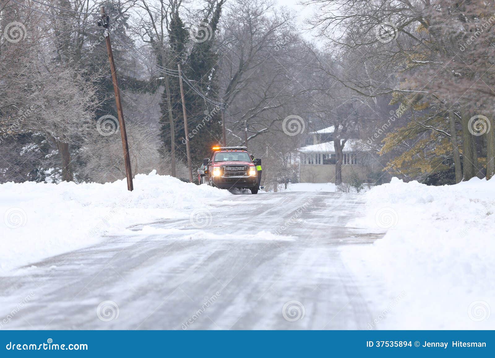 Emergency Vehicle in the Snow Stock Photo - Image of truck, shoveling ...