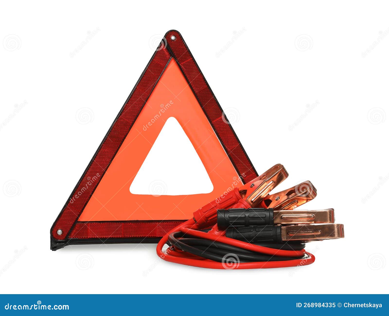 Emergency Warning Triangle and Battery Jumper Cables on White