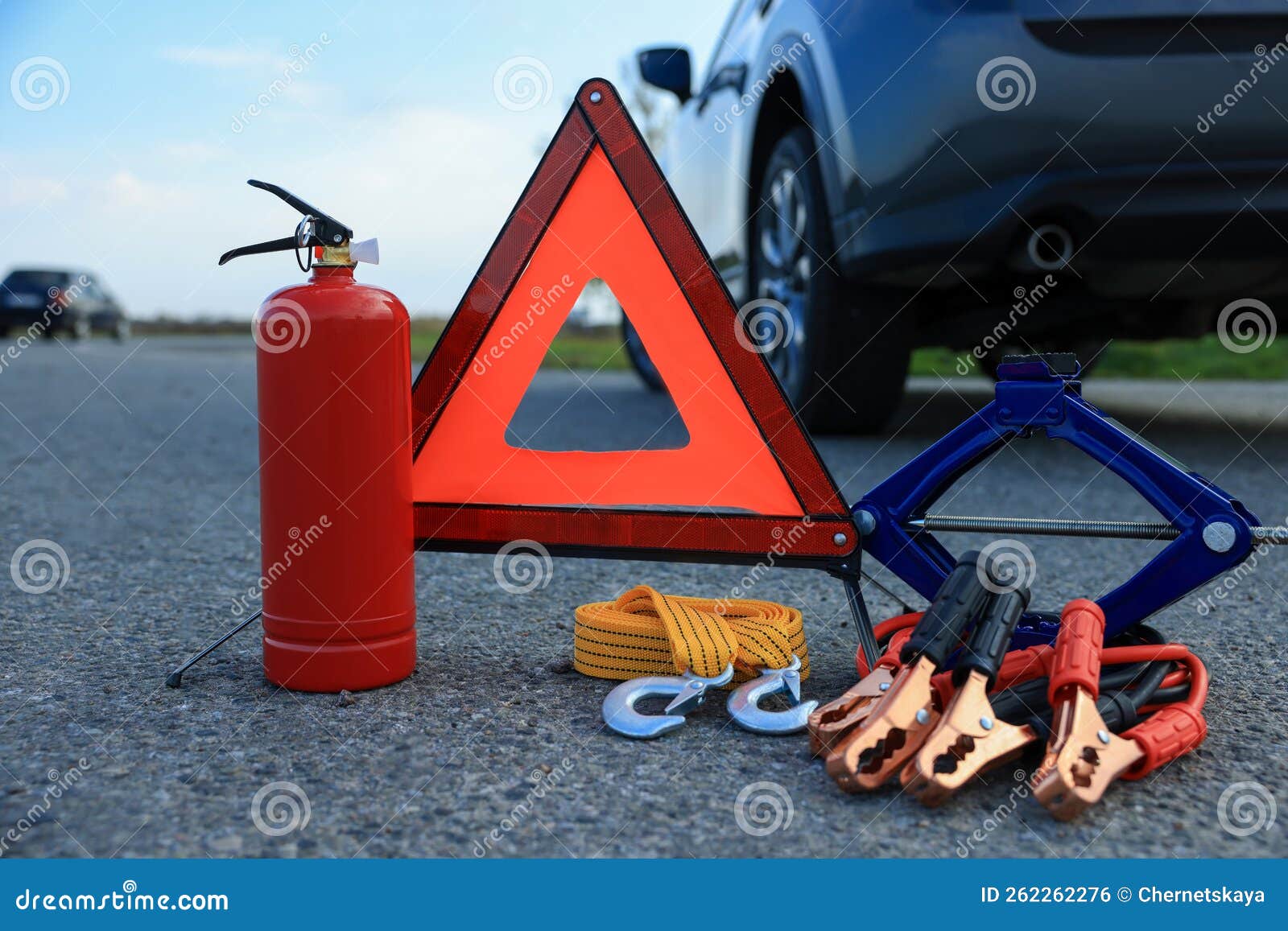 Emergency Warning Triangle and Car Safety Equipment Outdoors Stock