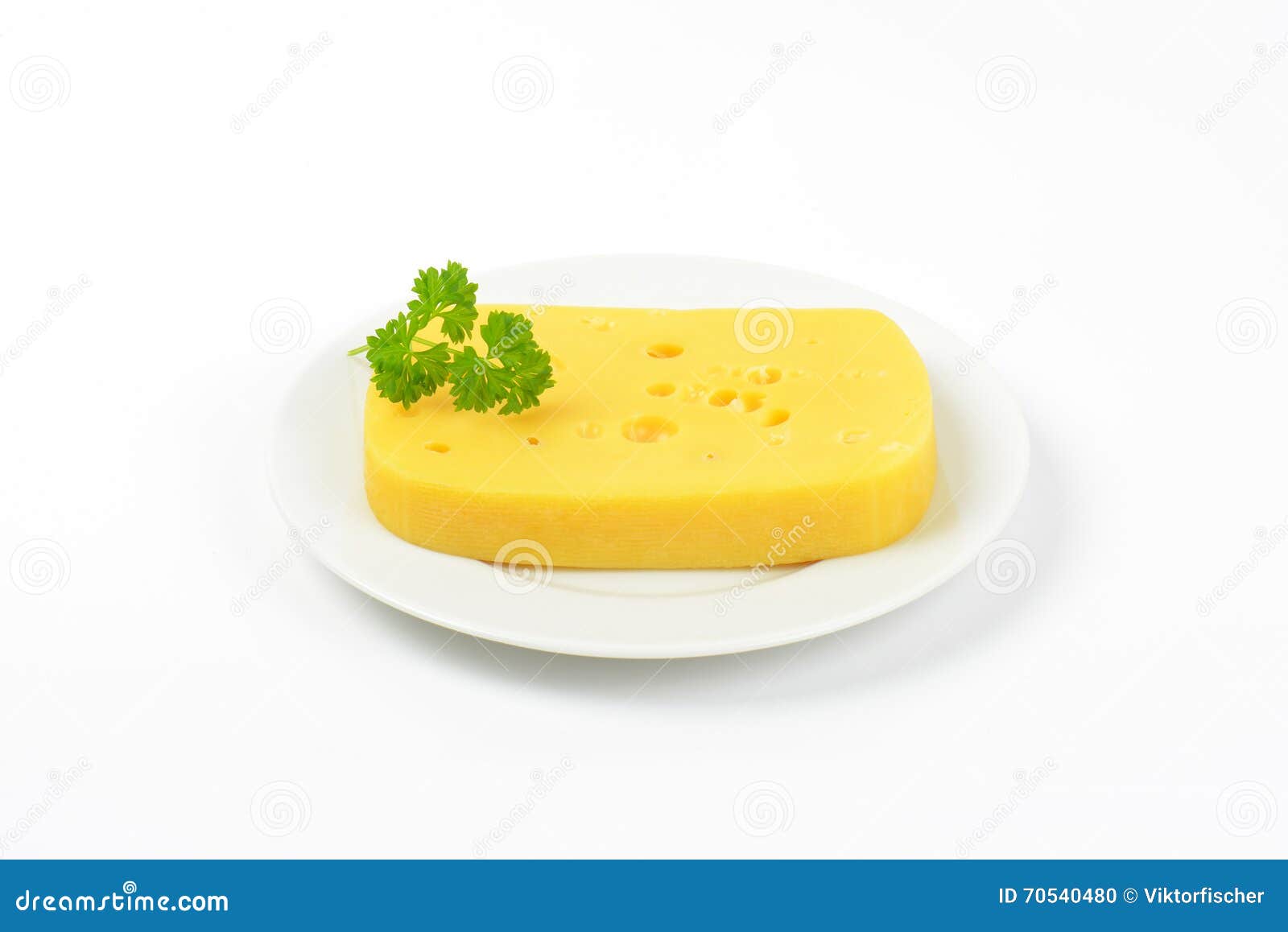 Emmental cheese with holes stock photo. Image of green 70540480