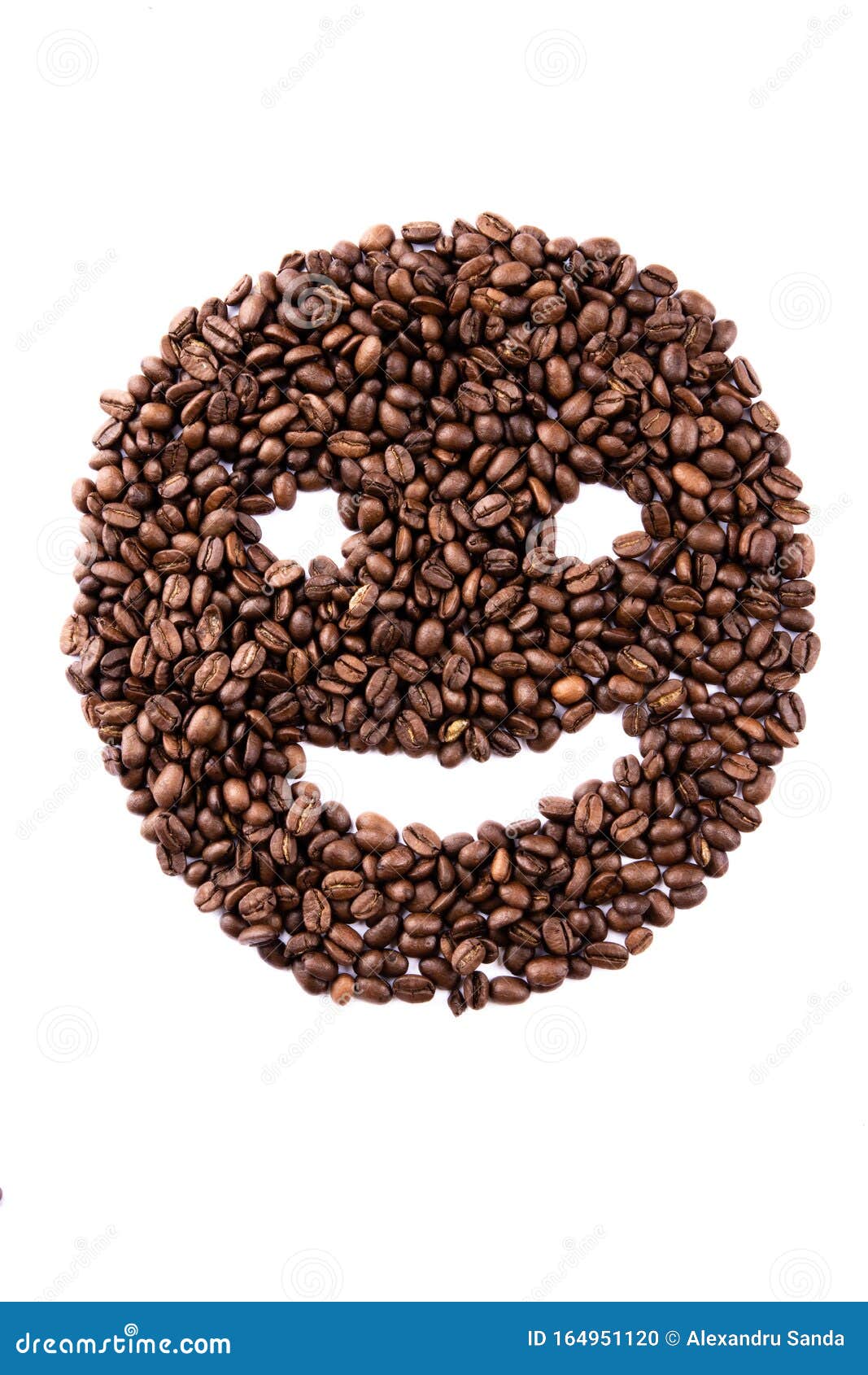 Emoticon Face Made of Coffee Beans on White Backgroud with Copyspace