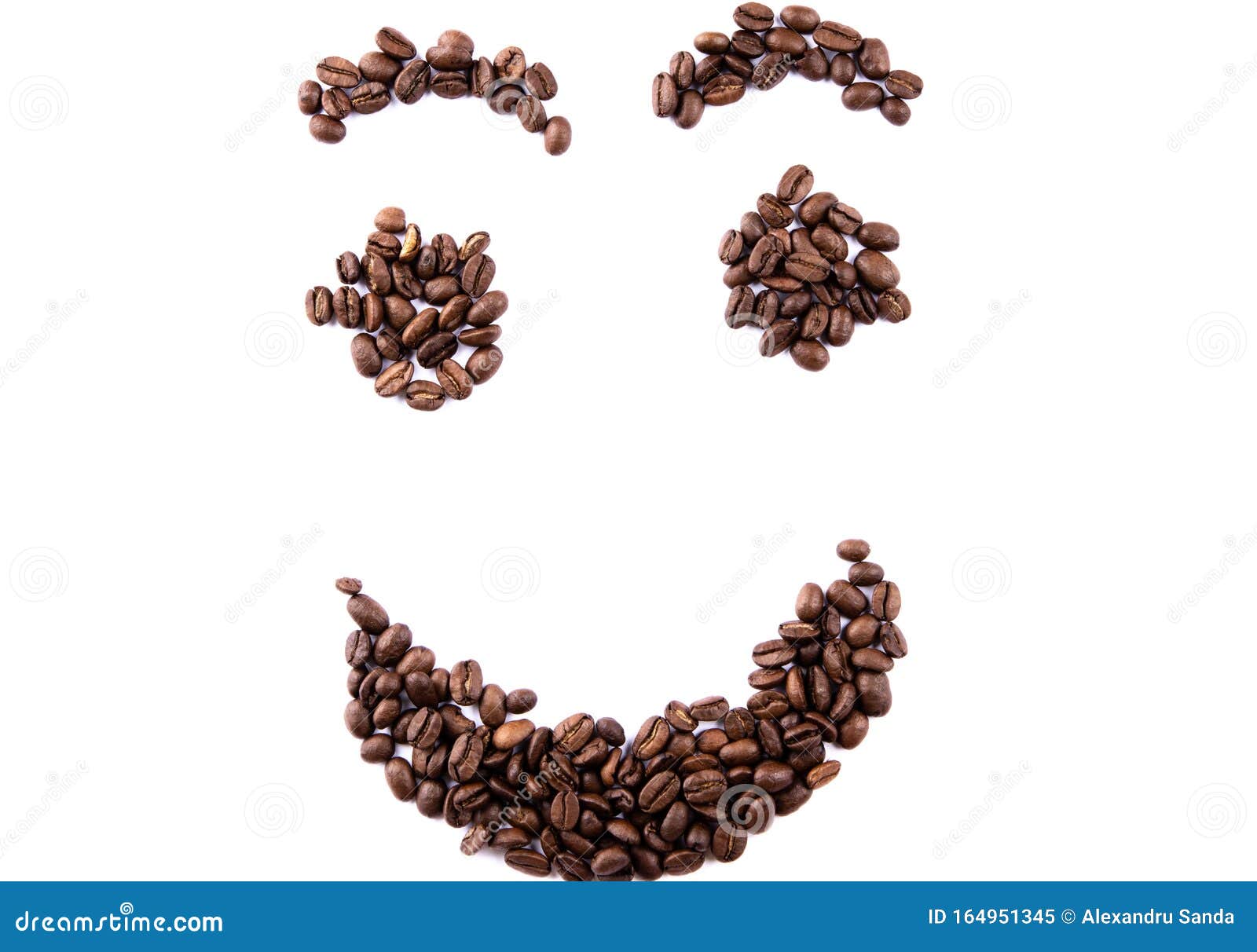 Emoticon Face Made of Coffee Beans on White Backgroud with Copyspace