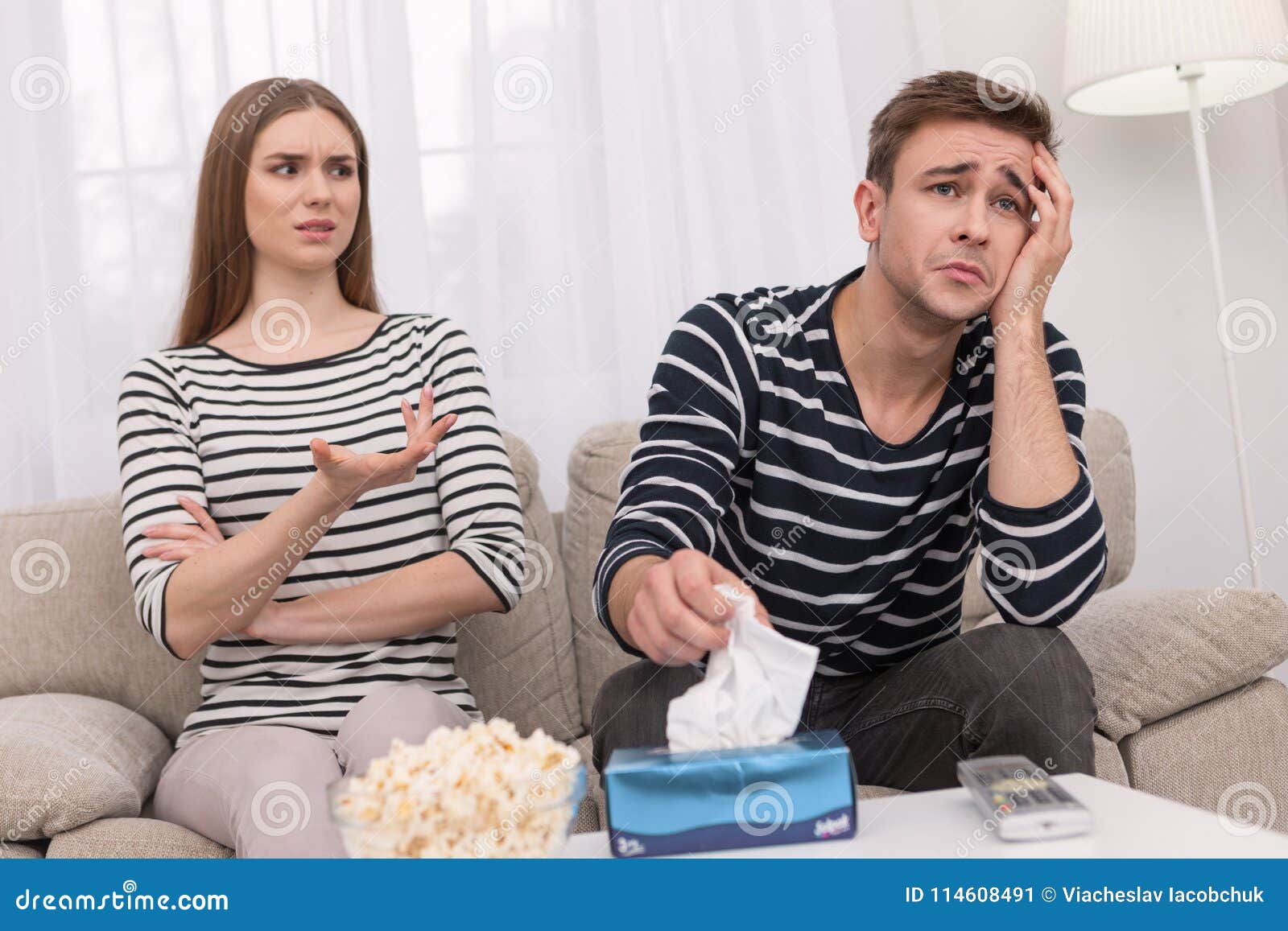 Sensitive Man Crying And Watching A Film Stock Image