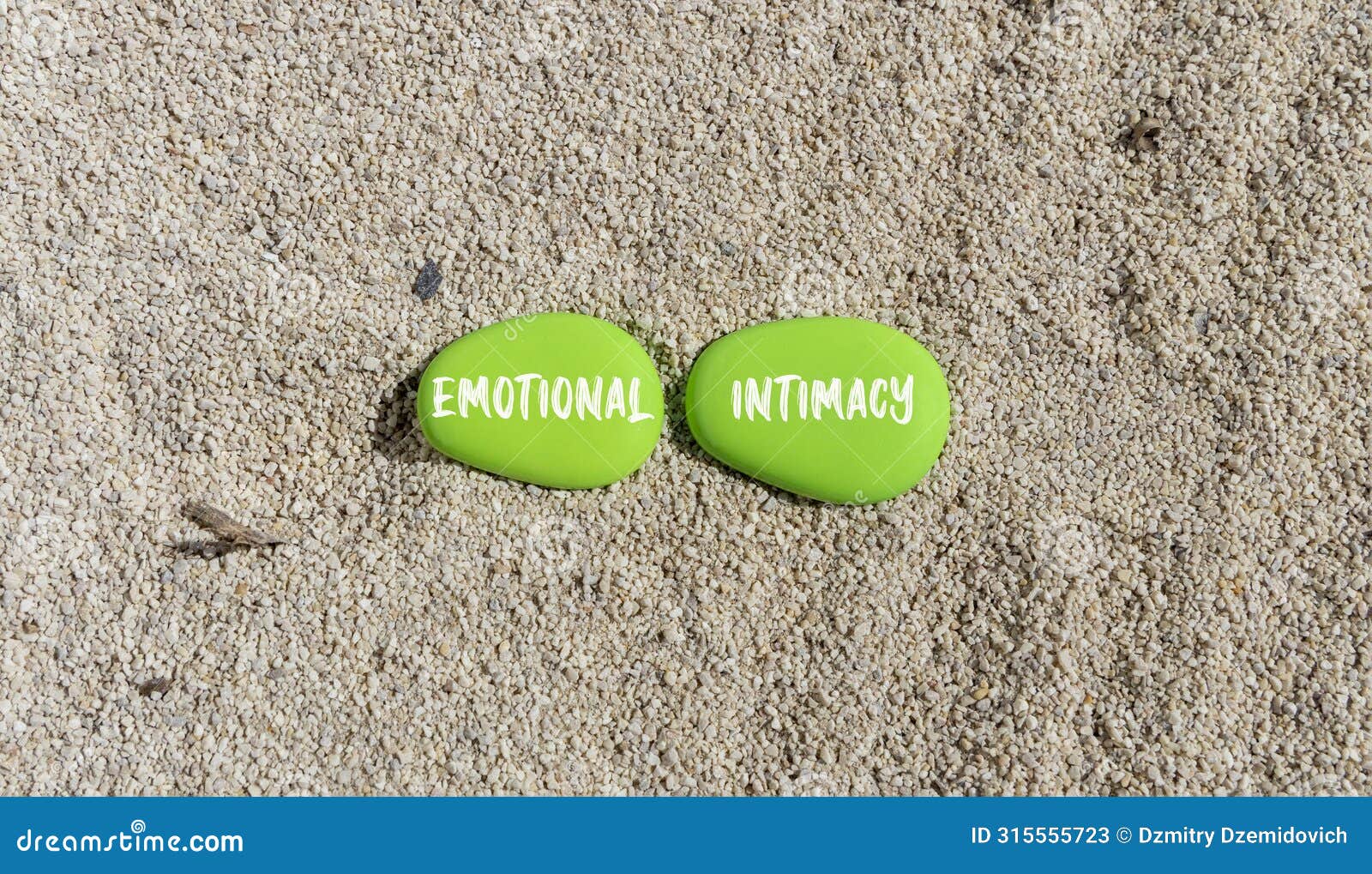 emotional intimacy . concept words emotional intimacy on beautiful green stone. beautiful sand beach background. psychology