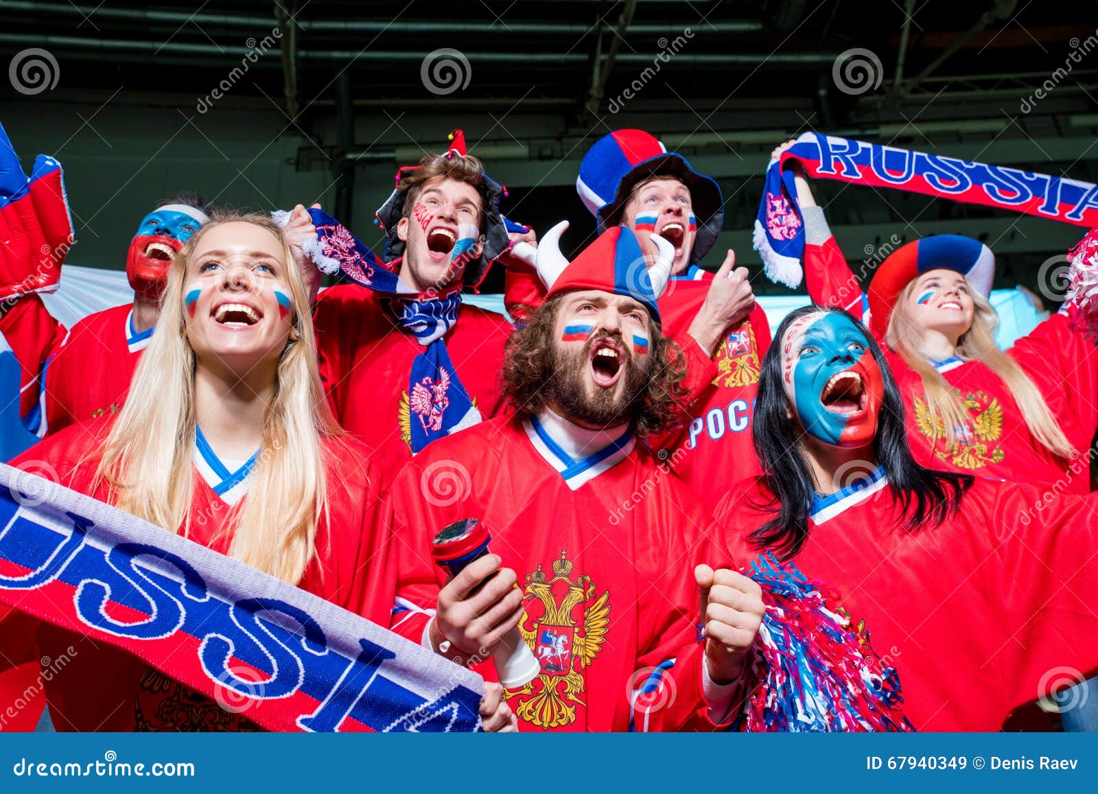 Emotional people. Happy sports fans in stadium