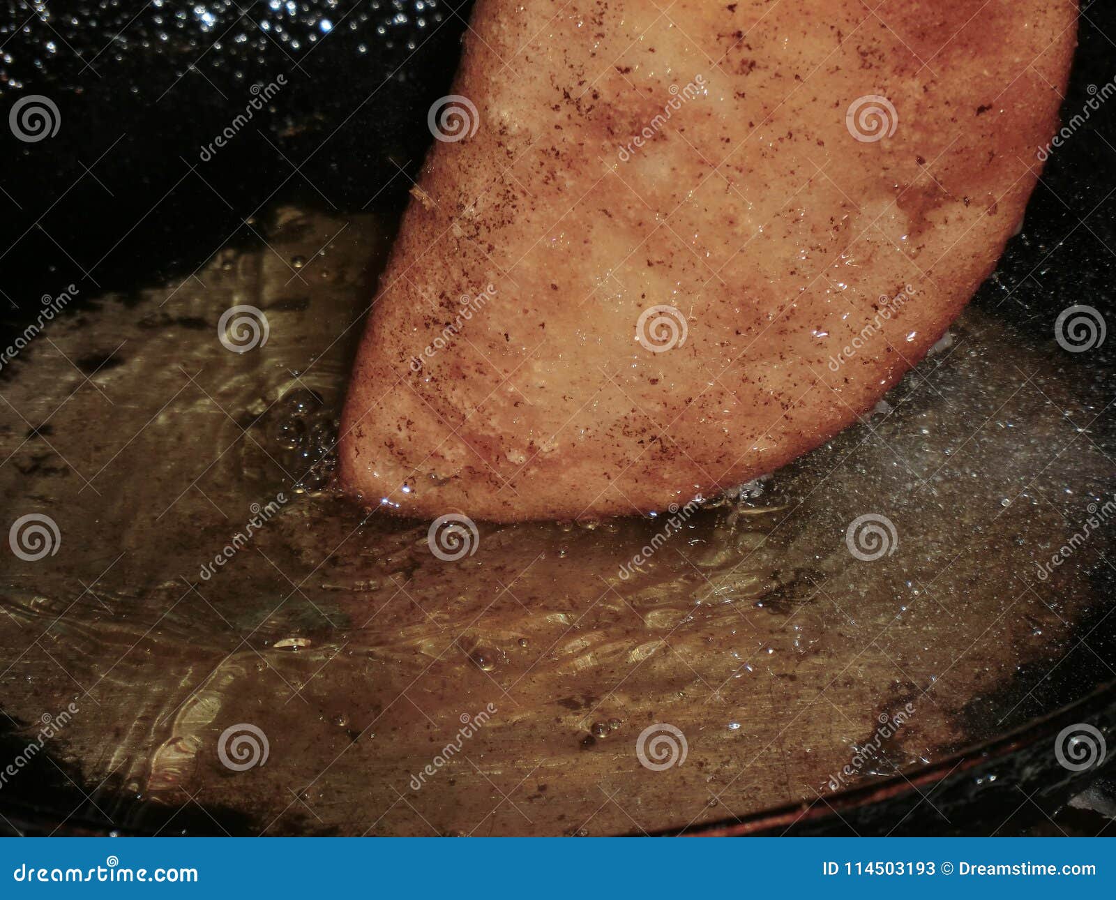 empanada being fried