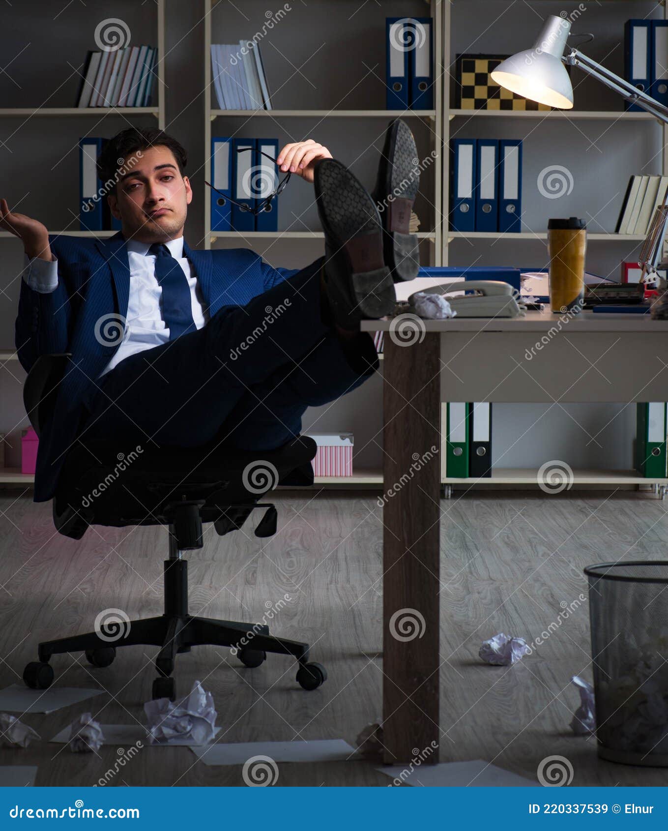 employee working late to finish important deliverable task