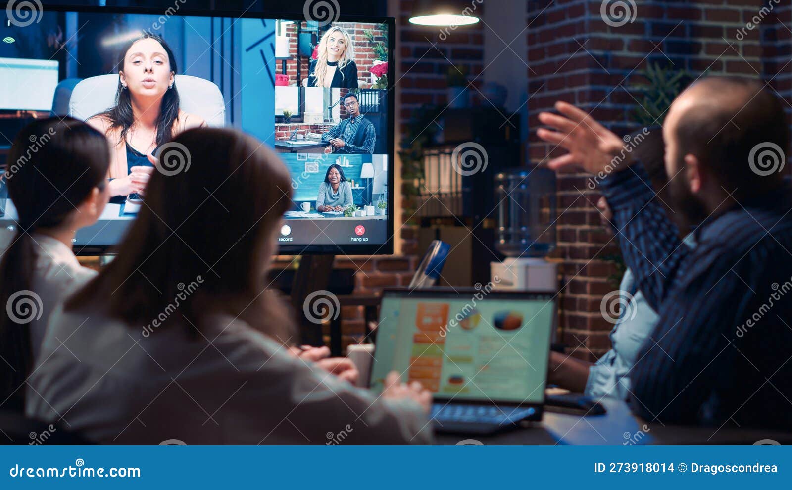 Employees Talking with Remote Team in Videoconference Stock Photo