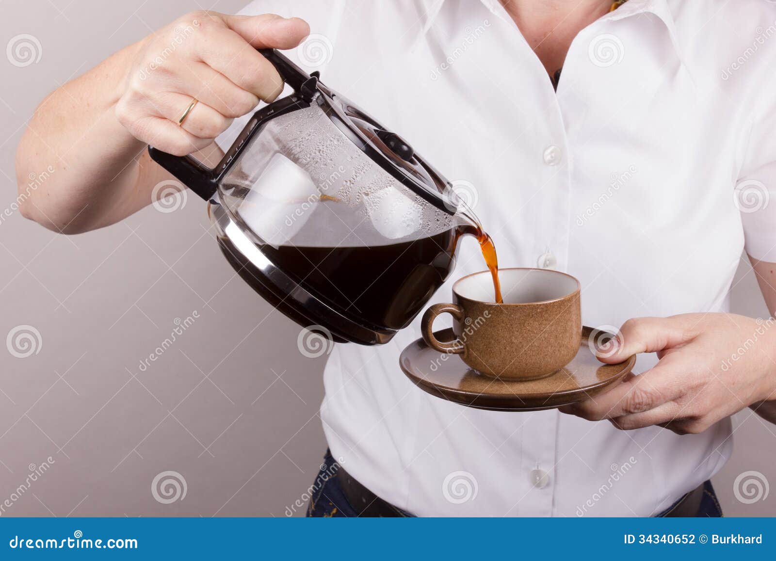employing coffee in a cup