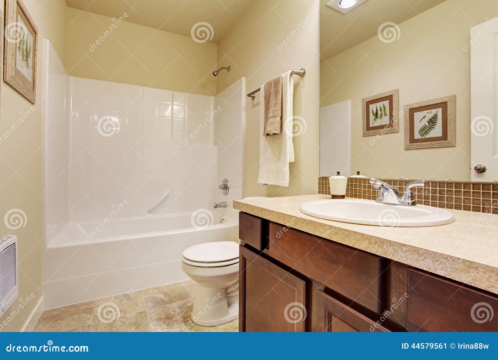 Empty Bathroom In Soft Ivory Color With Tile Wall Trim ...