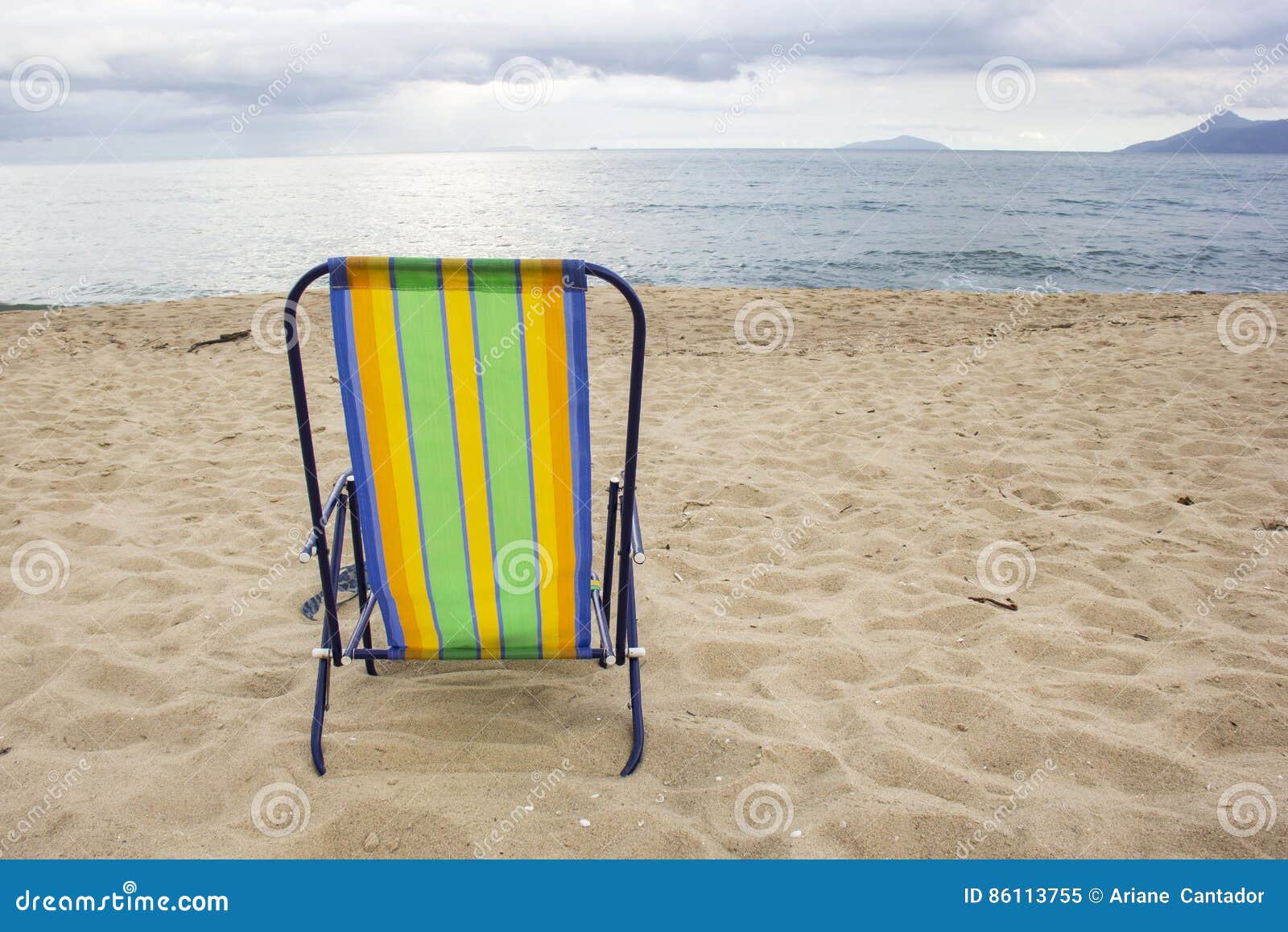 Empty Beach Chair at the Edge of the Beach. Stock Image Image of