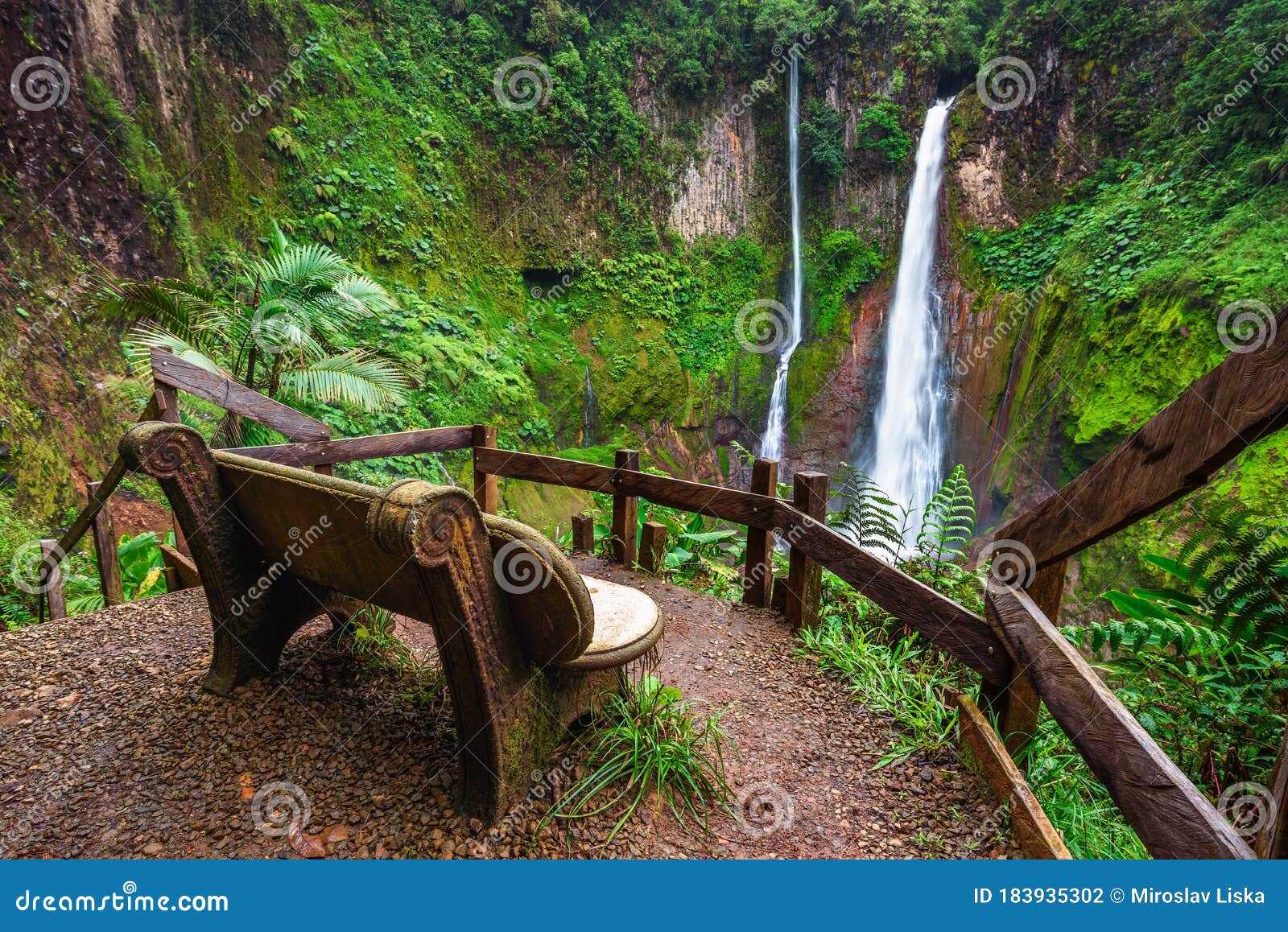 empty bench at the catarata del toro waterfall in costa rica