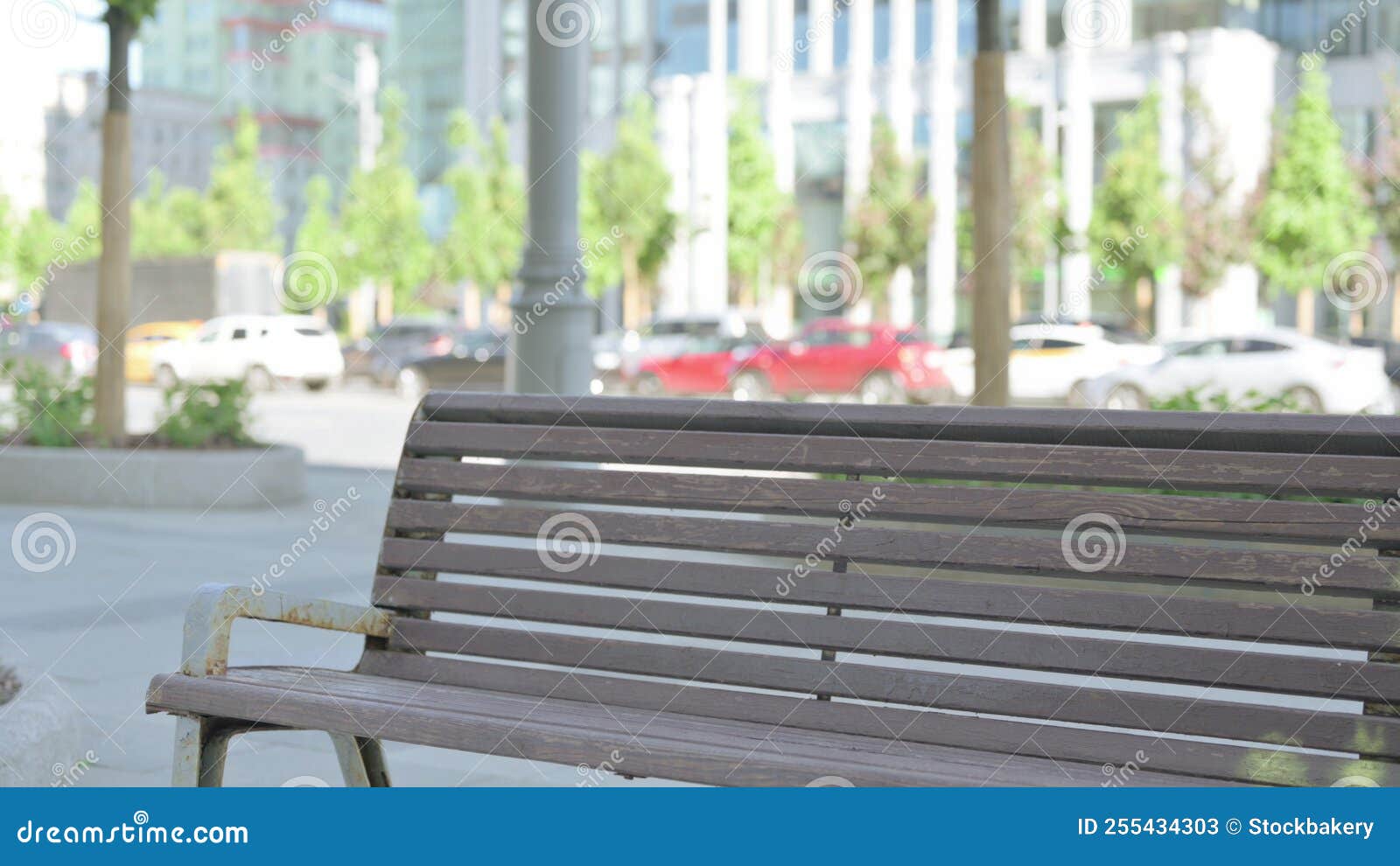 empty bench on street in the moning