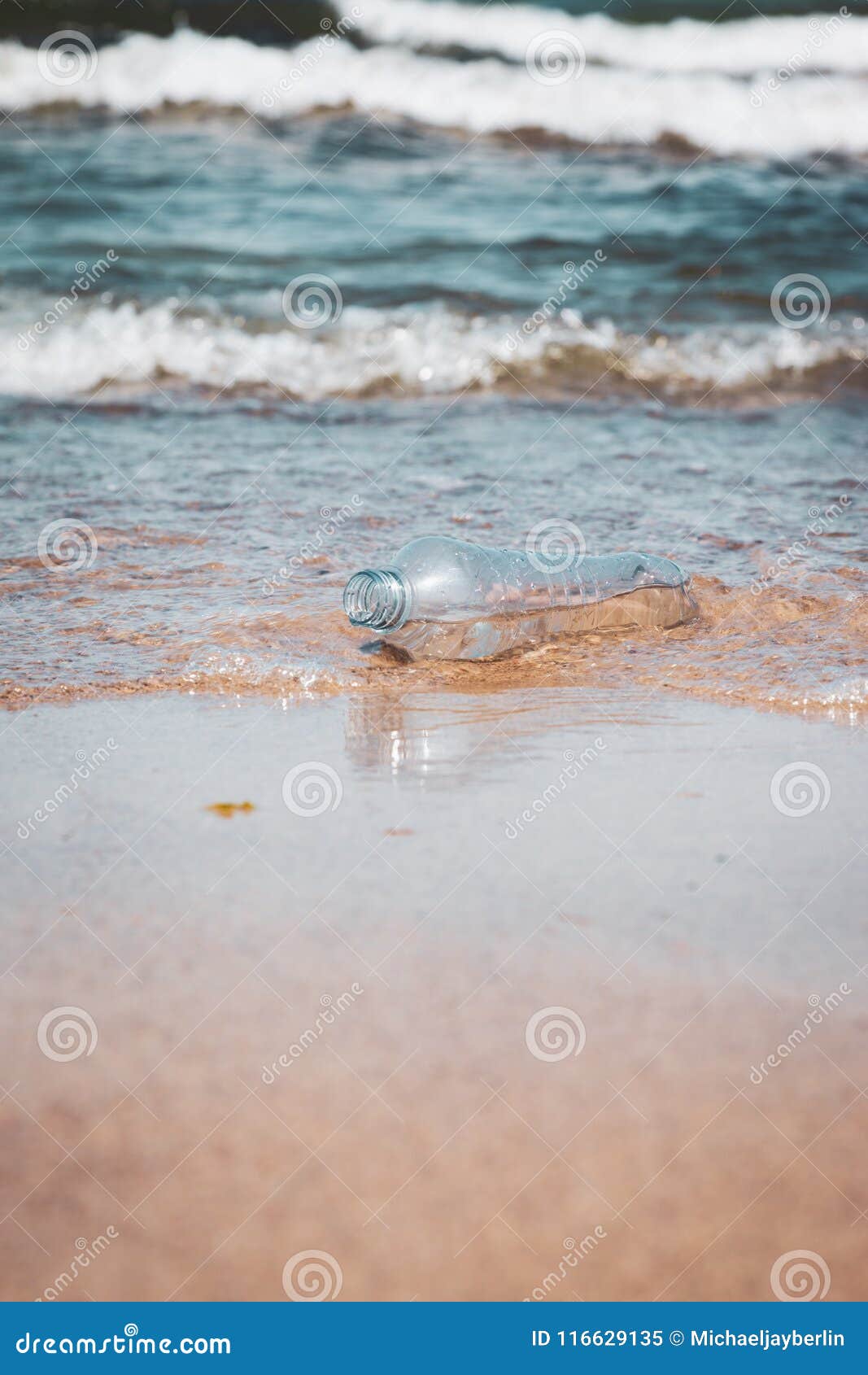 Plastic Bottle in Ocean Water, Littering the Sea Concept Image Stock