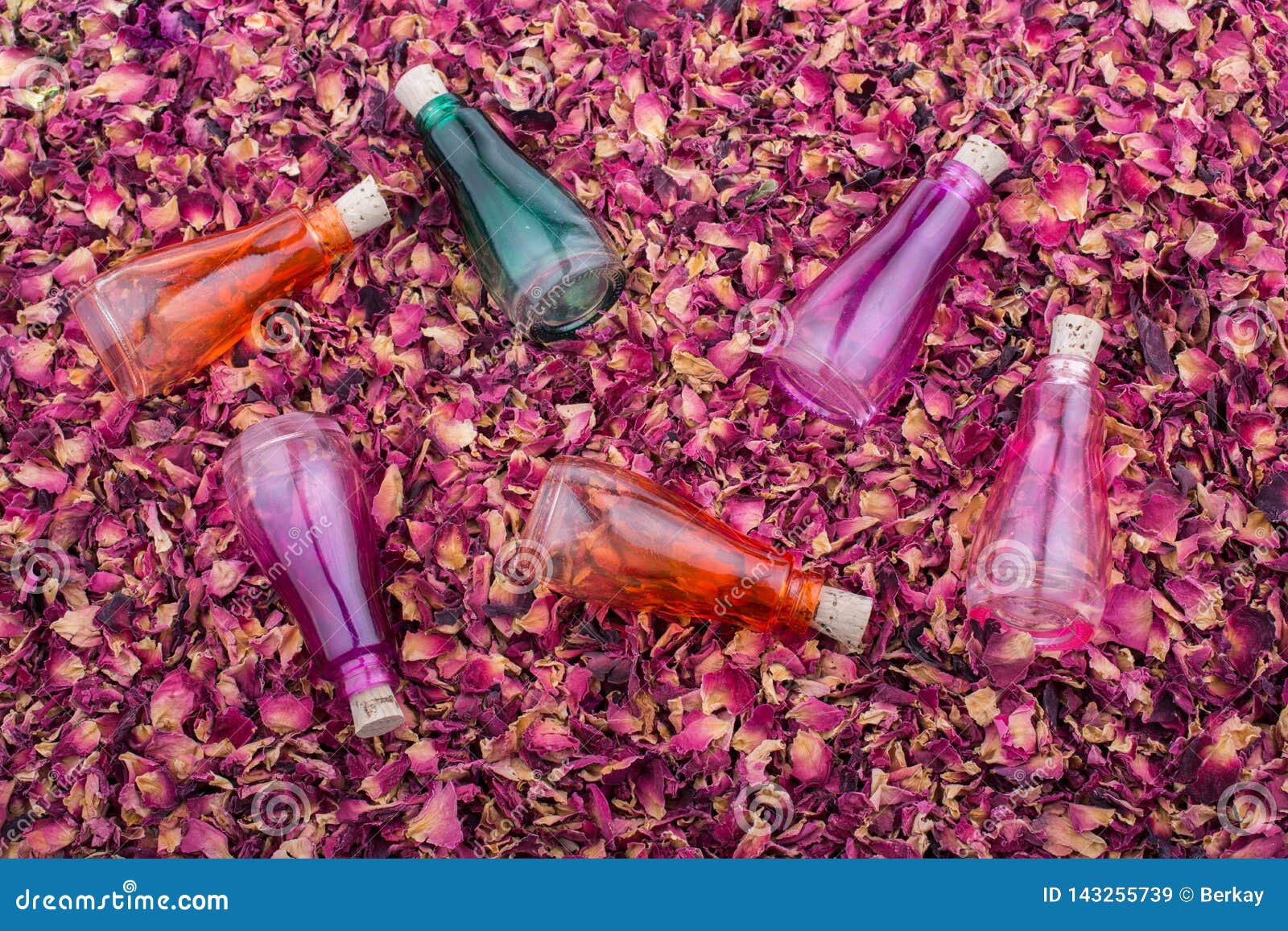 Empty Bottles on Dry Rose Petal Background Stock Image Image of herb