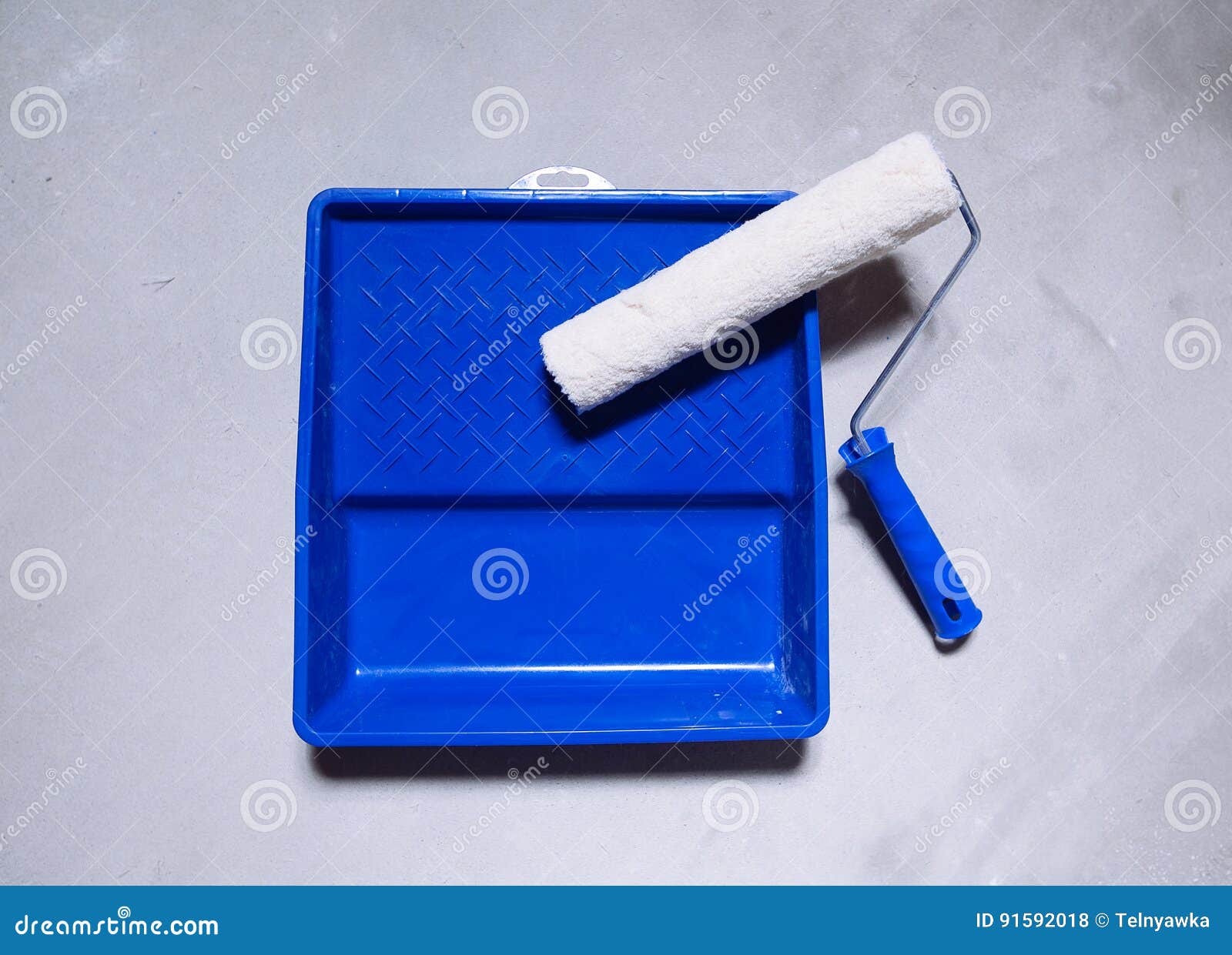 Empty Bucket of Paint and a Brush Roller Paint Tray Stock Photo Image