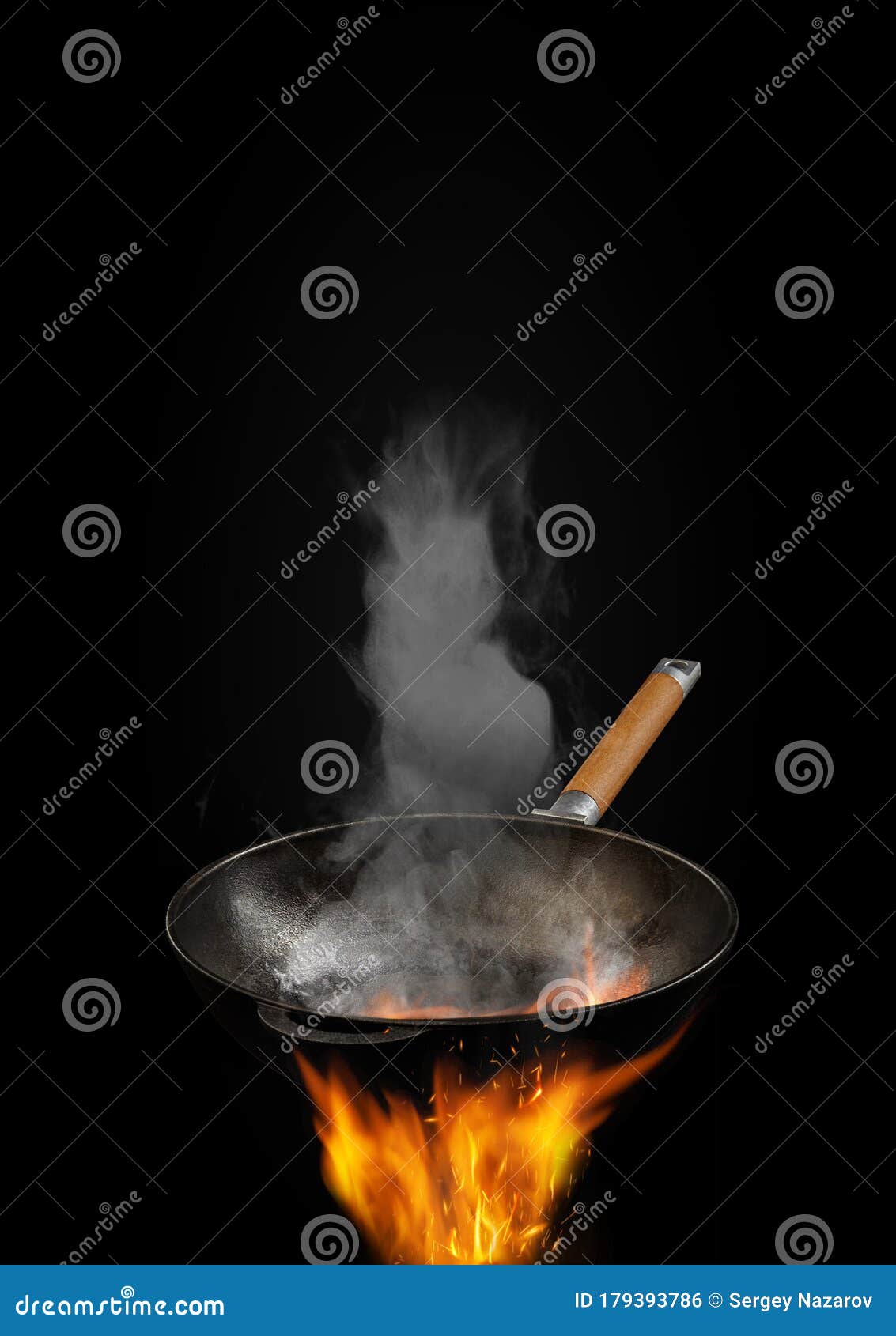 Download Empty Burning Wok Pan With Smoke Above Fire Against Black Background. Cooking Concept. Mockup ...