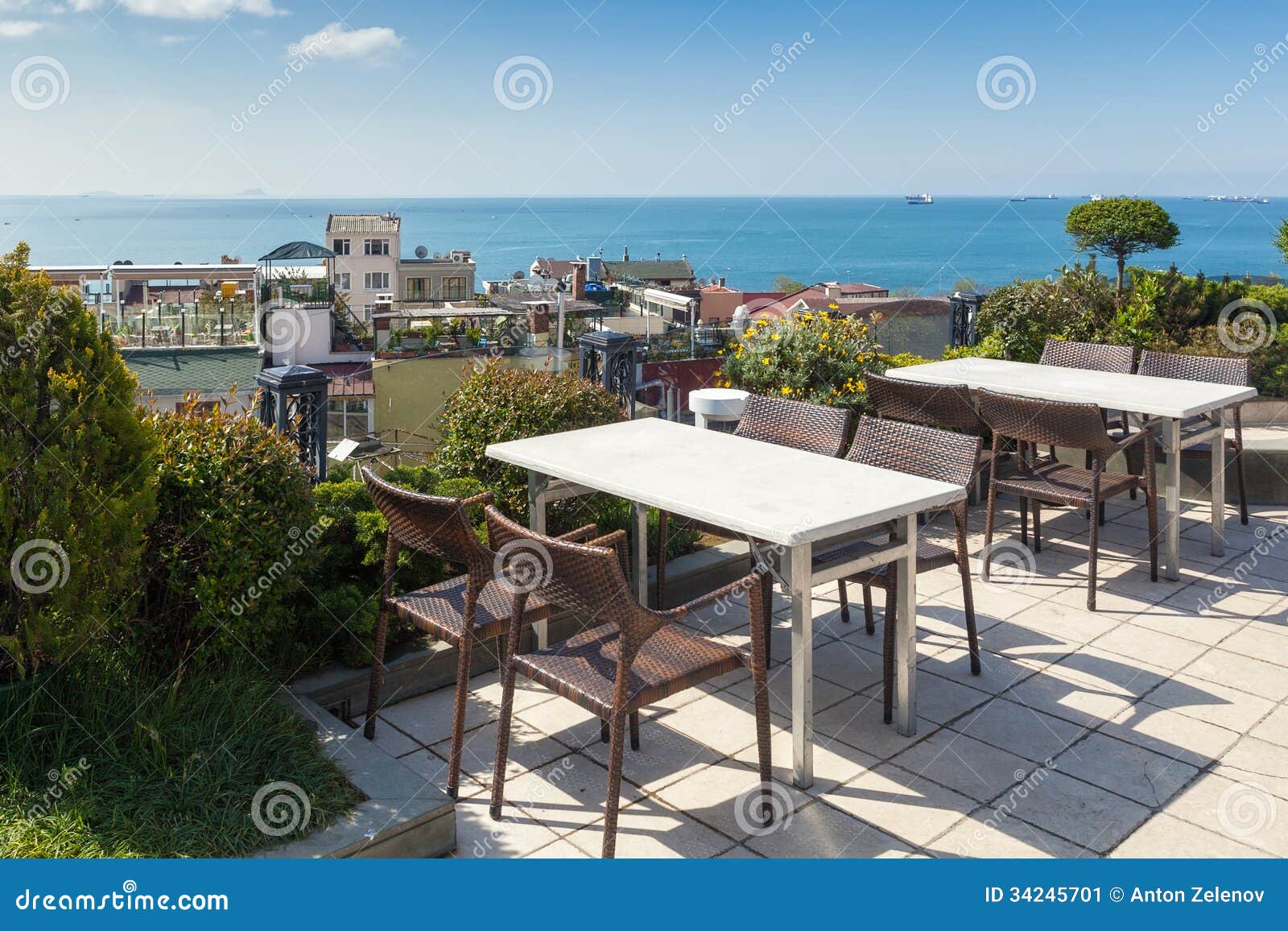 empty cafe tables high over city and marmara sea, istanbul