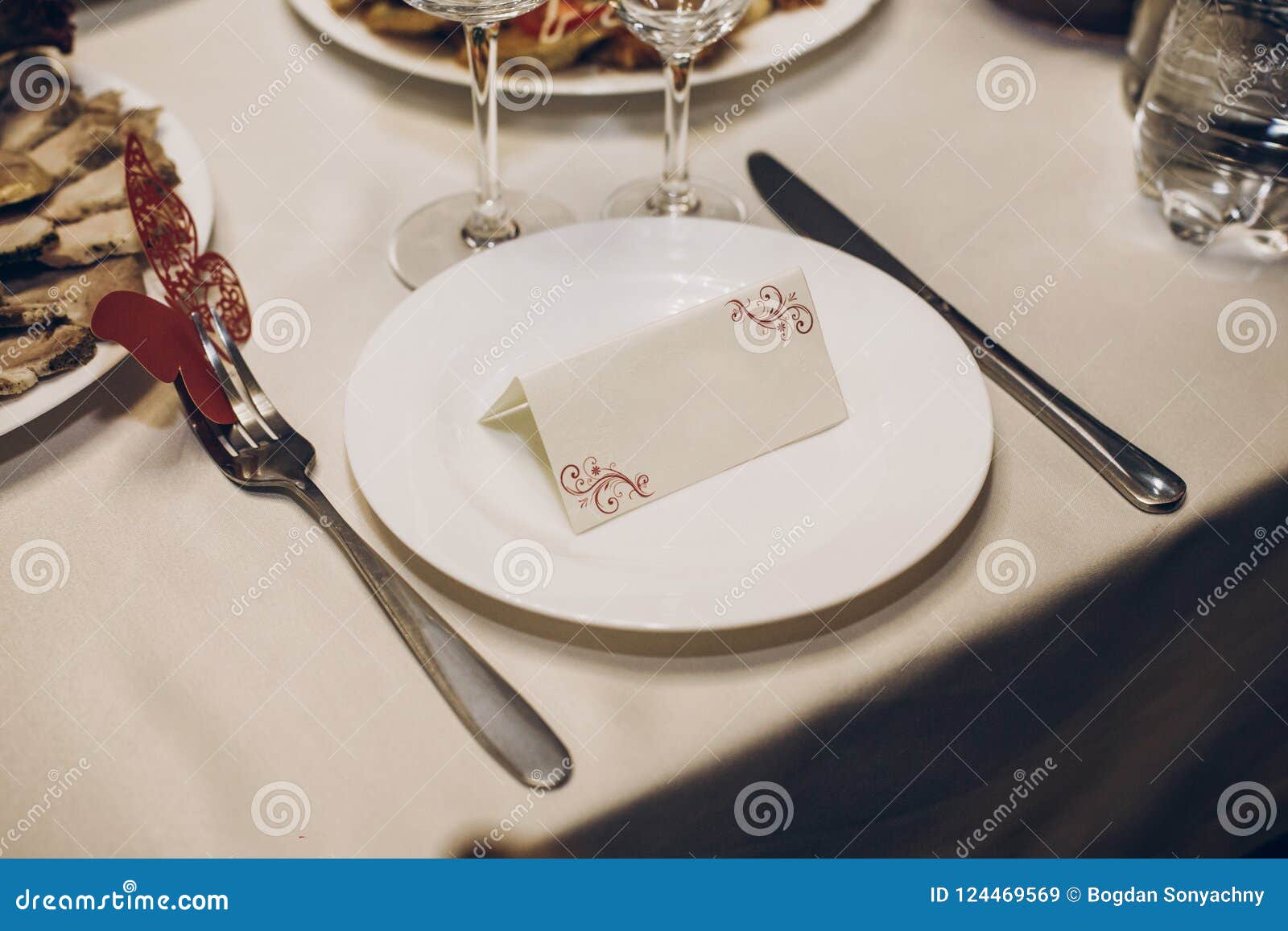 Empty Card On Plate On Table With Cutlery Setting At Wedding Re