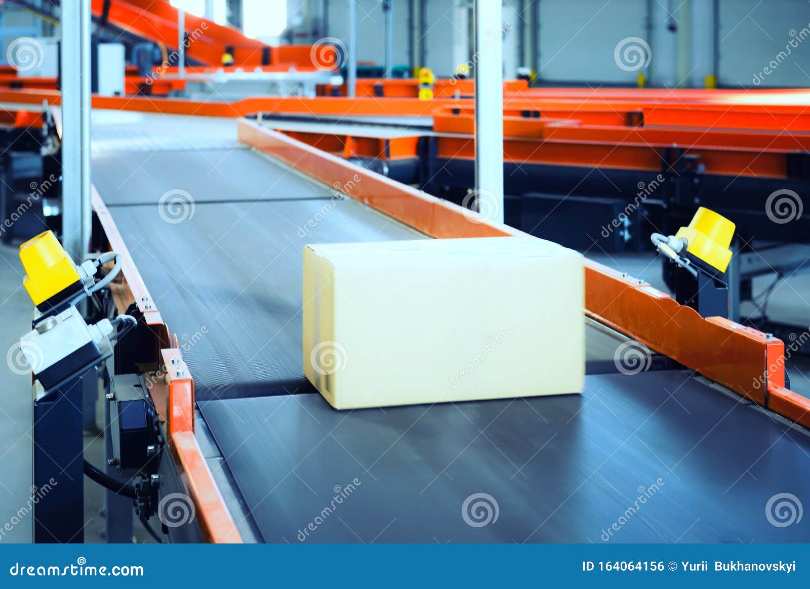Cardboard Boxes on Conveyor Belt.parcels Transportation System Concept