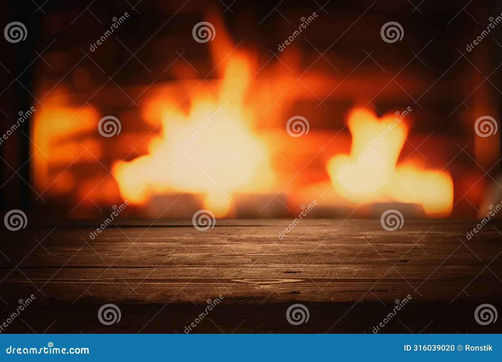 empty brown wooden tabletop for product display on blurred wood burning fireplace background