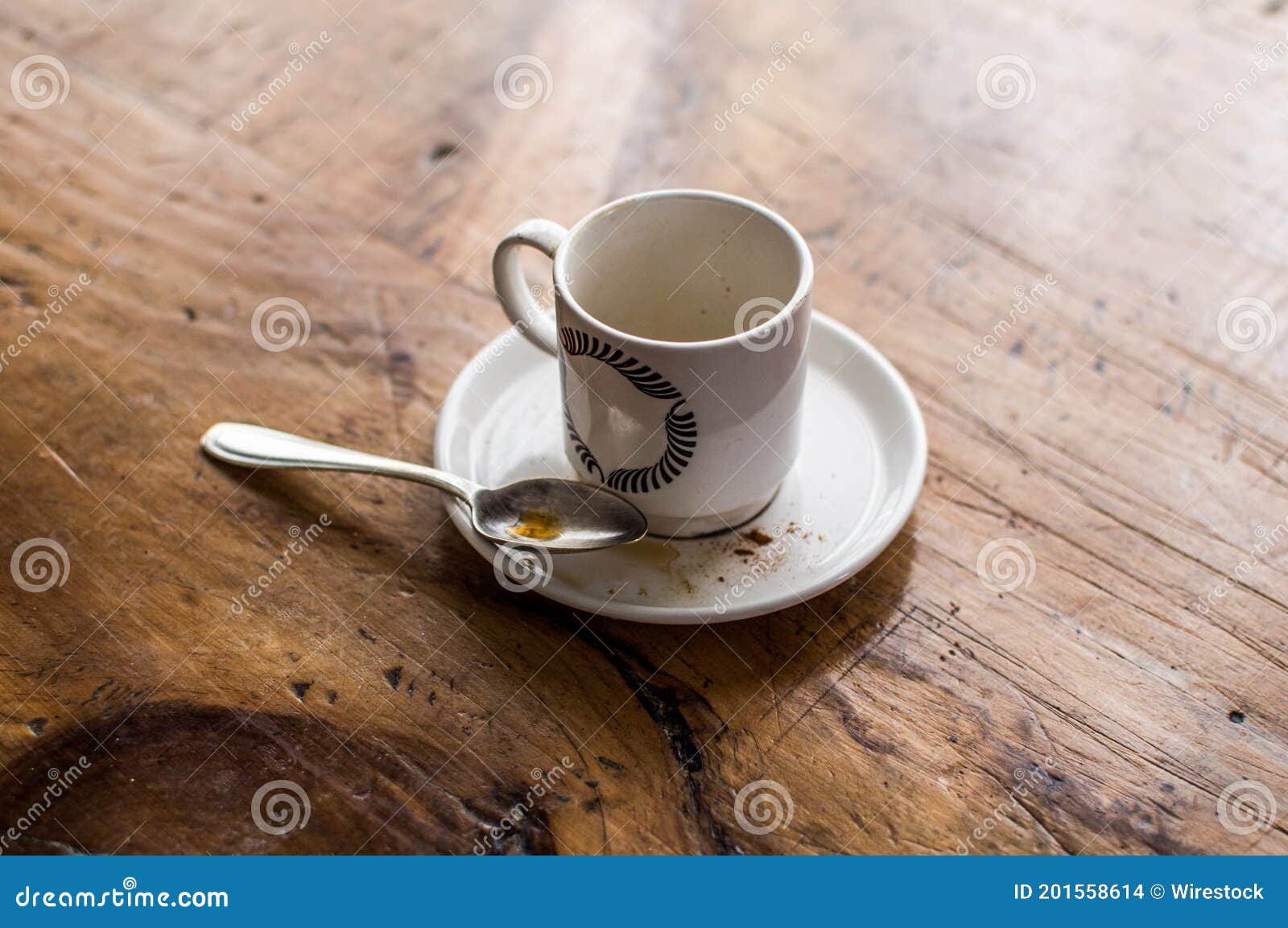 Empty Dirty Coffee Cup with a Spoon Stock Photo Image of wooden