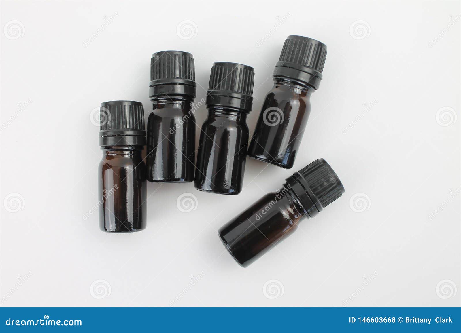 Empty Essential Oil Bottles on a White Background Isolated Stock Photo