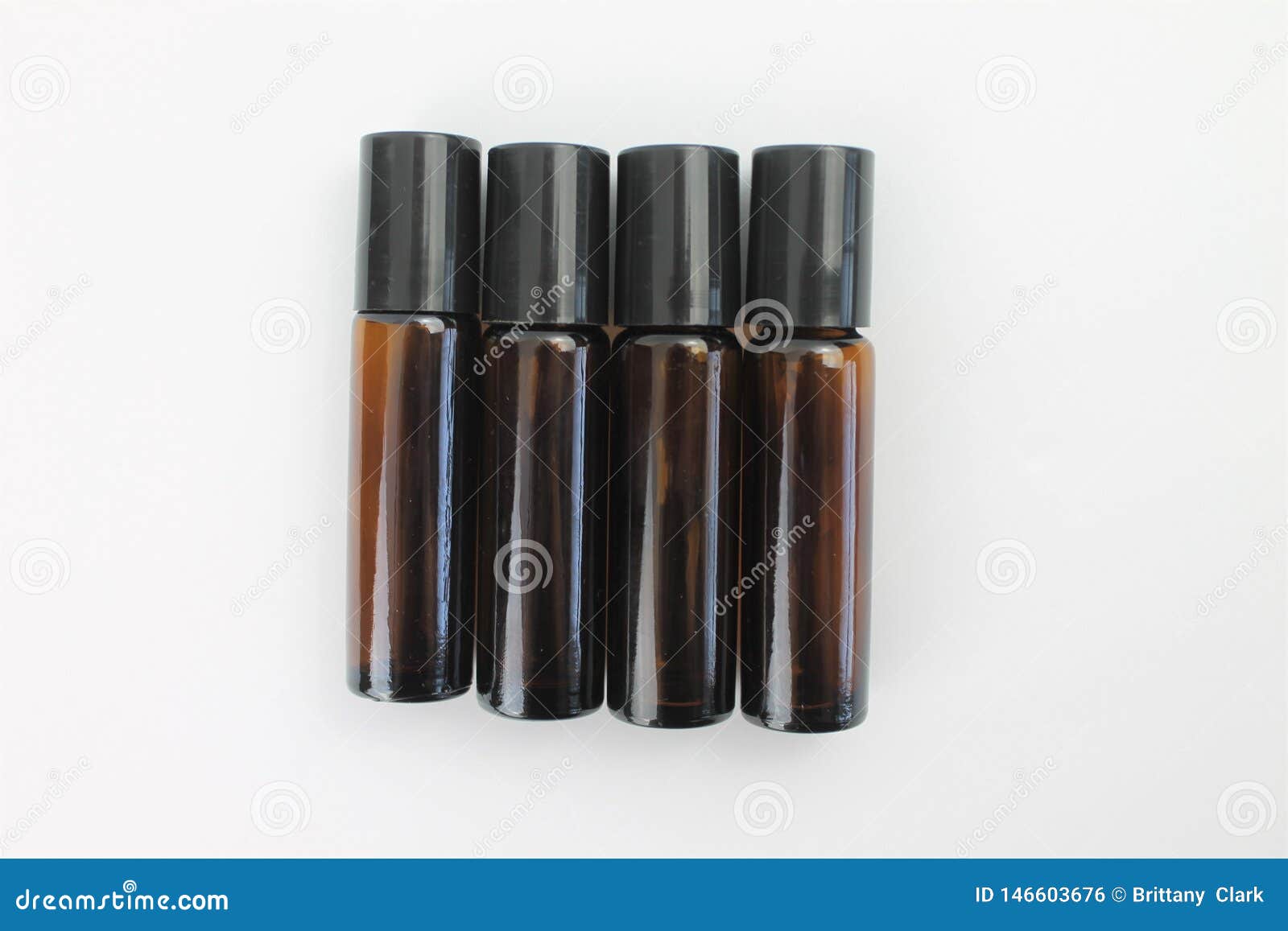 Empty Essential Oil Bottles on a White Background Isolated Stock Photo