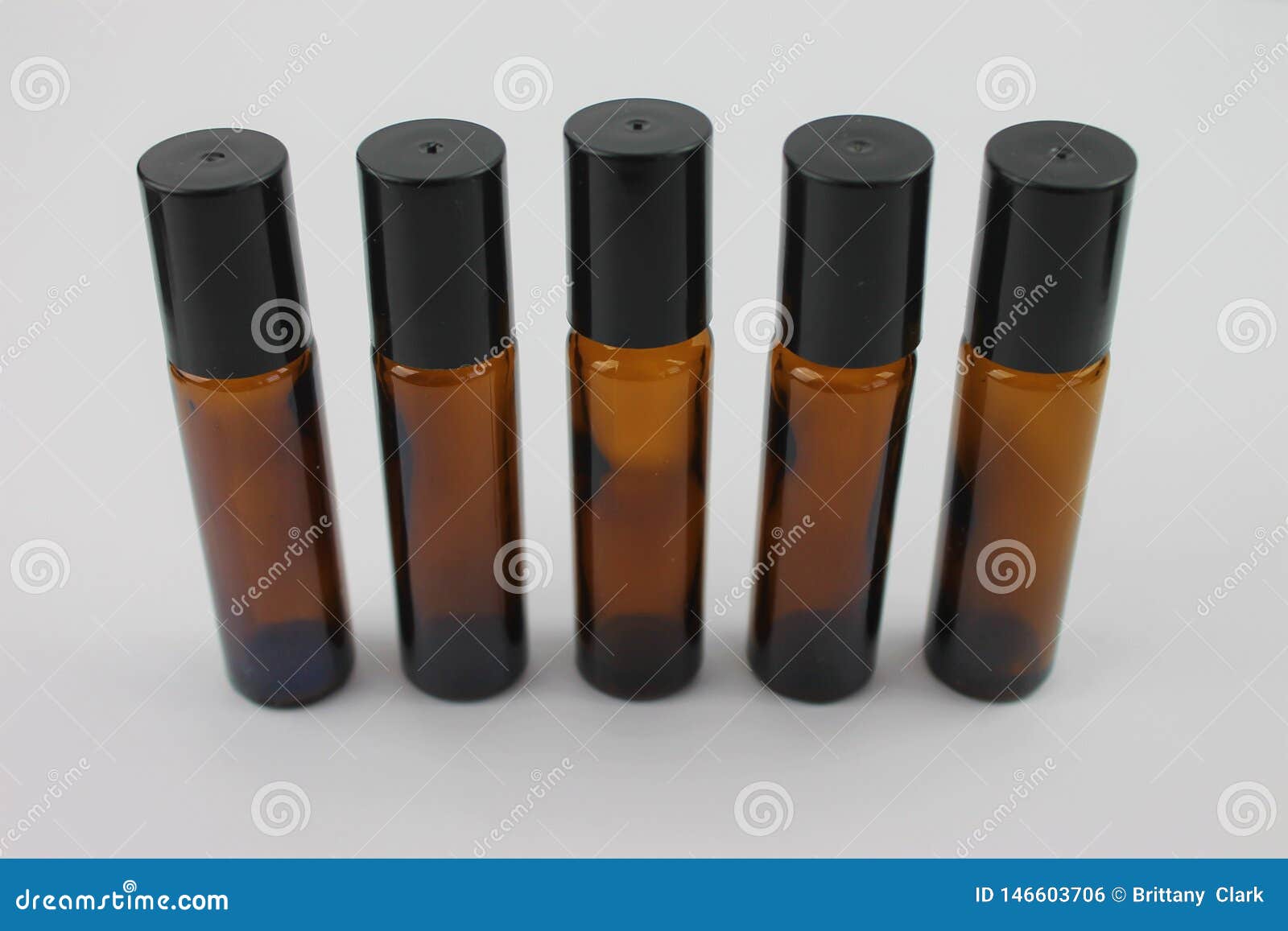 Empty Essential Oil Bottles on a White Background Isolated Stock Photo