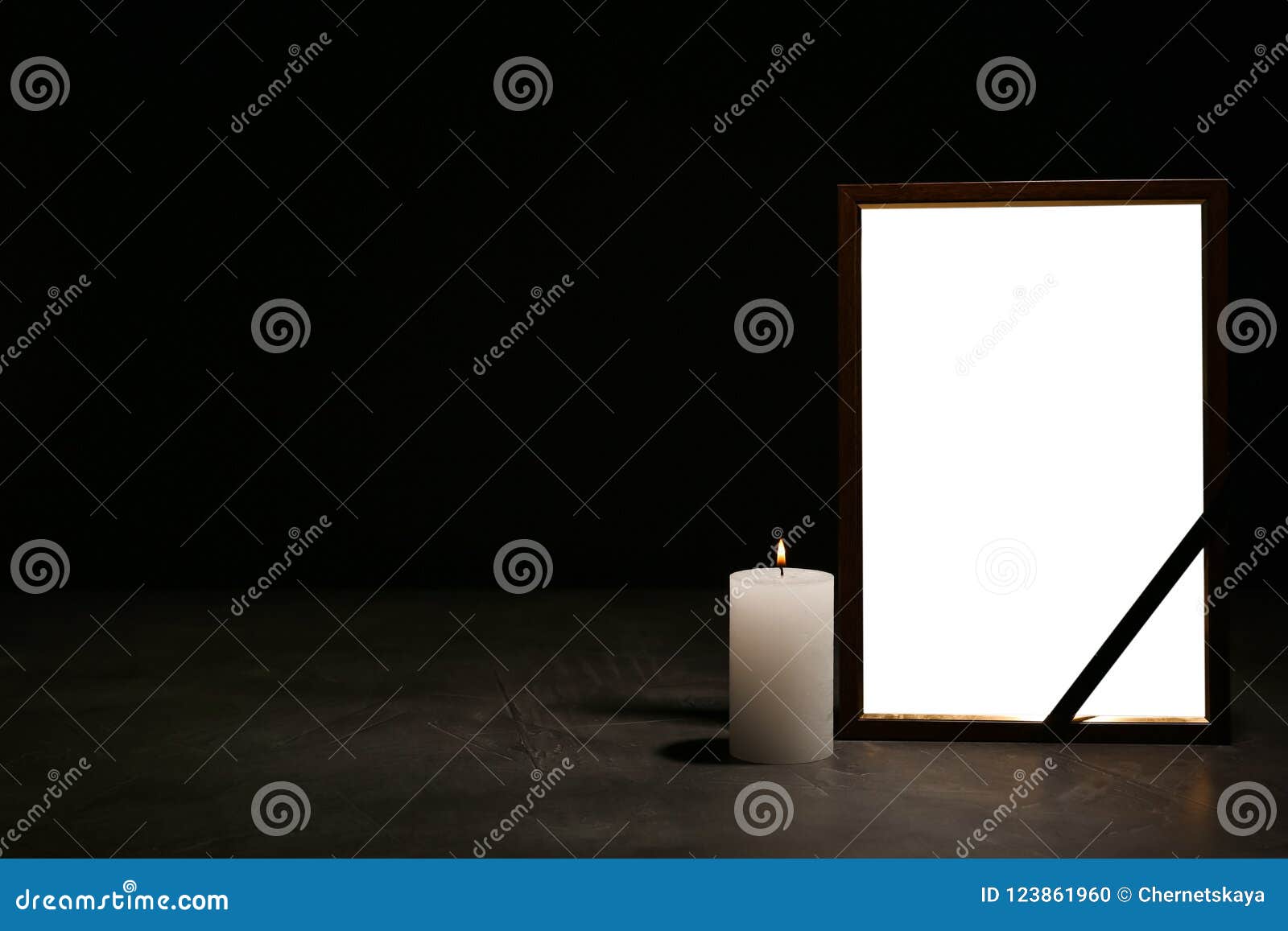 Black ribbon on dark background, top view with space for text. Funeral  symbol Stock Photo by ©NewAfrica 303049460