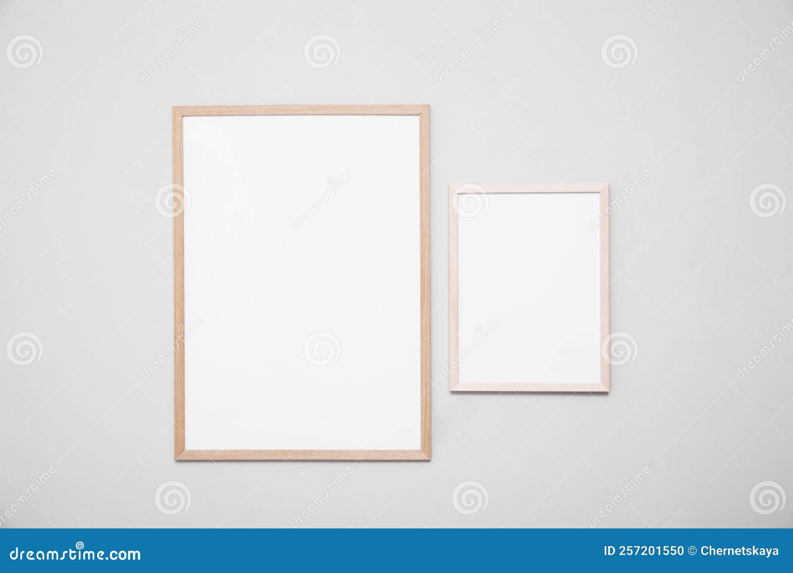 Empty Frames on Grey Wall. Mockup for Design Stock Photo Image of