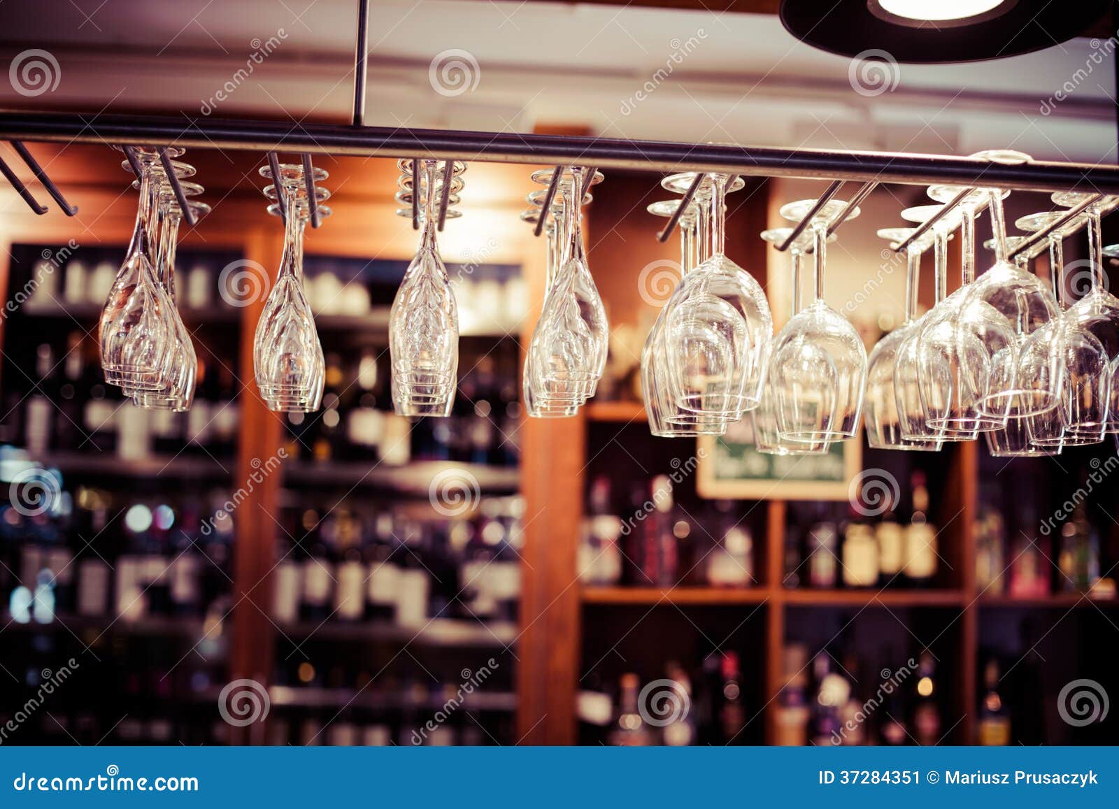 Empty Glasses for Wine Above a Bar Rack Stock Image Image of brown