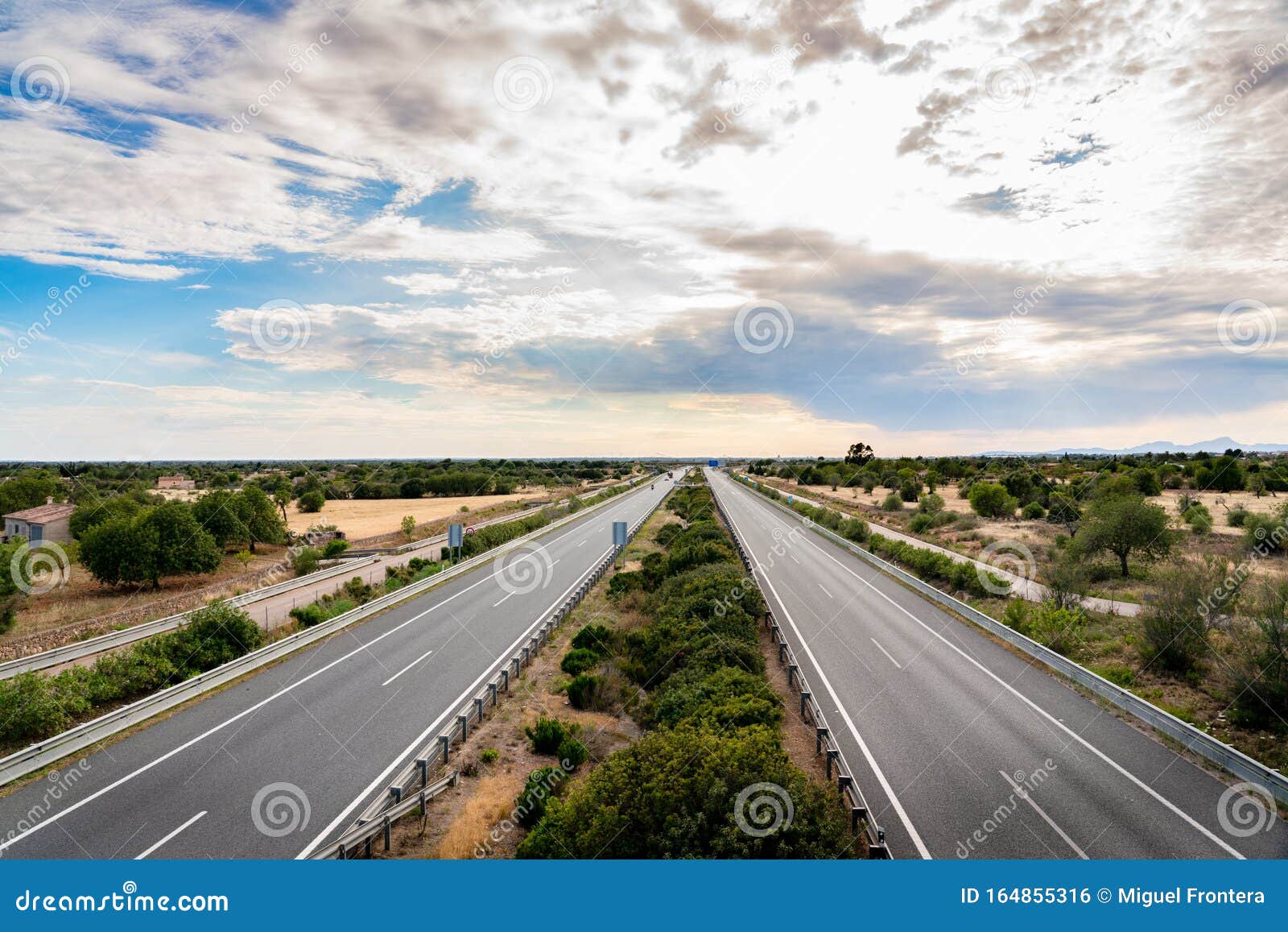 empty highway in mallorca with spectacular sky