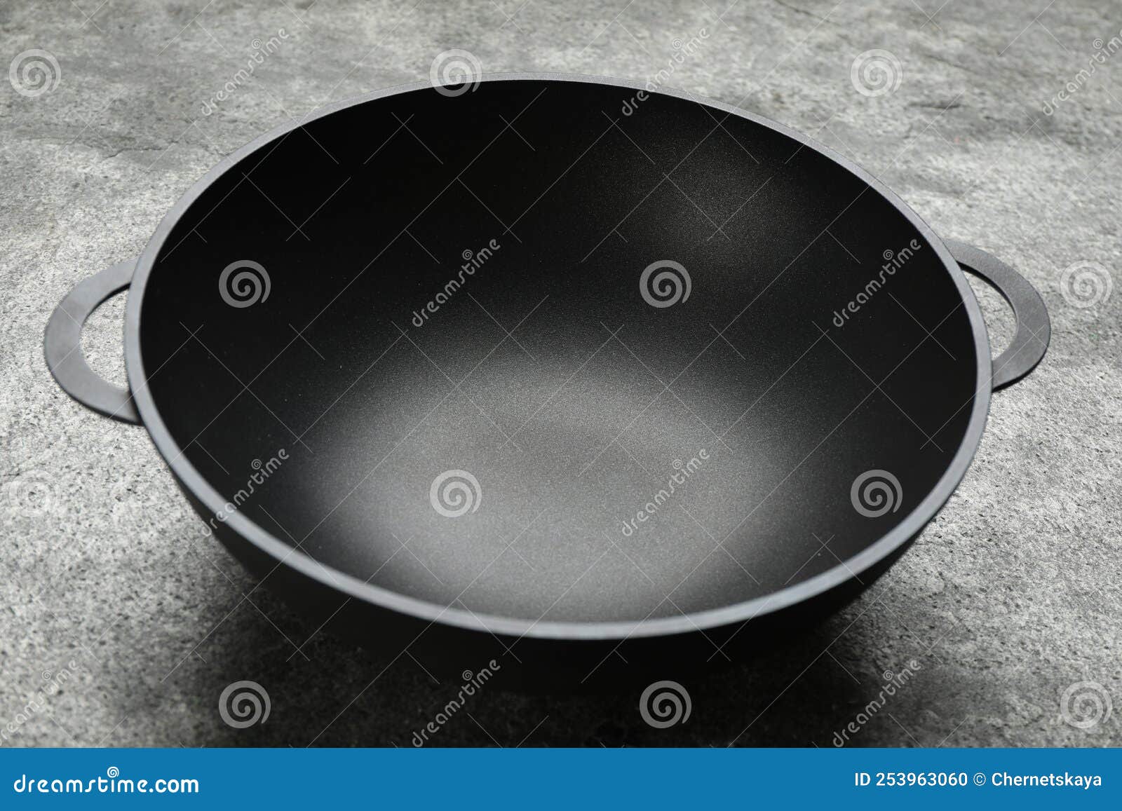 Empty Iron Wok on Grey Table. Chinese Cookware Stock Photo Image of